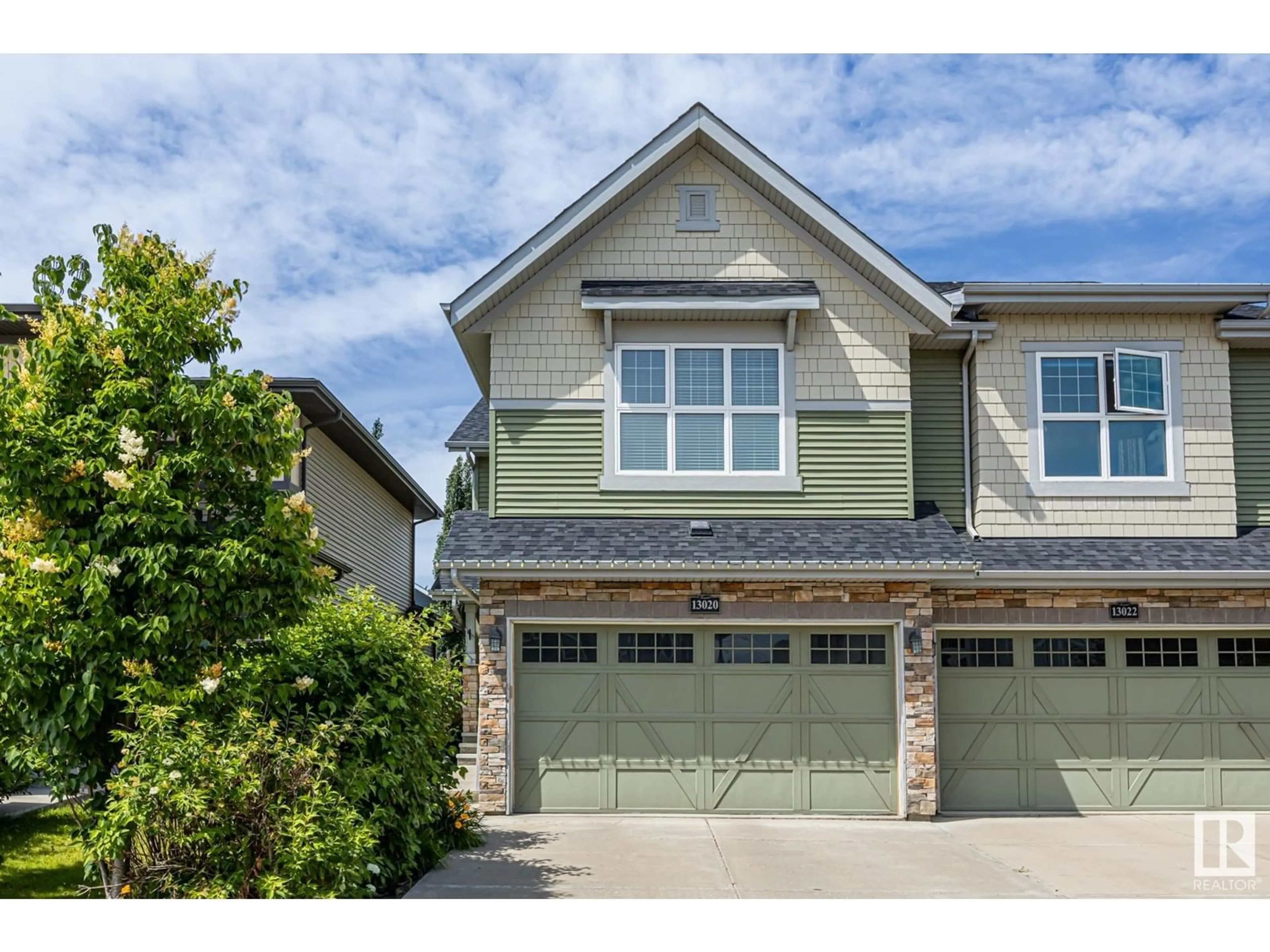 Home with vinyl exterior material, street for NW - 13020 205 ST, Edmonton Alberta T5S0J2
