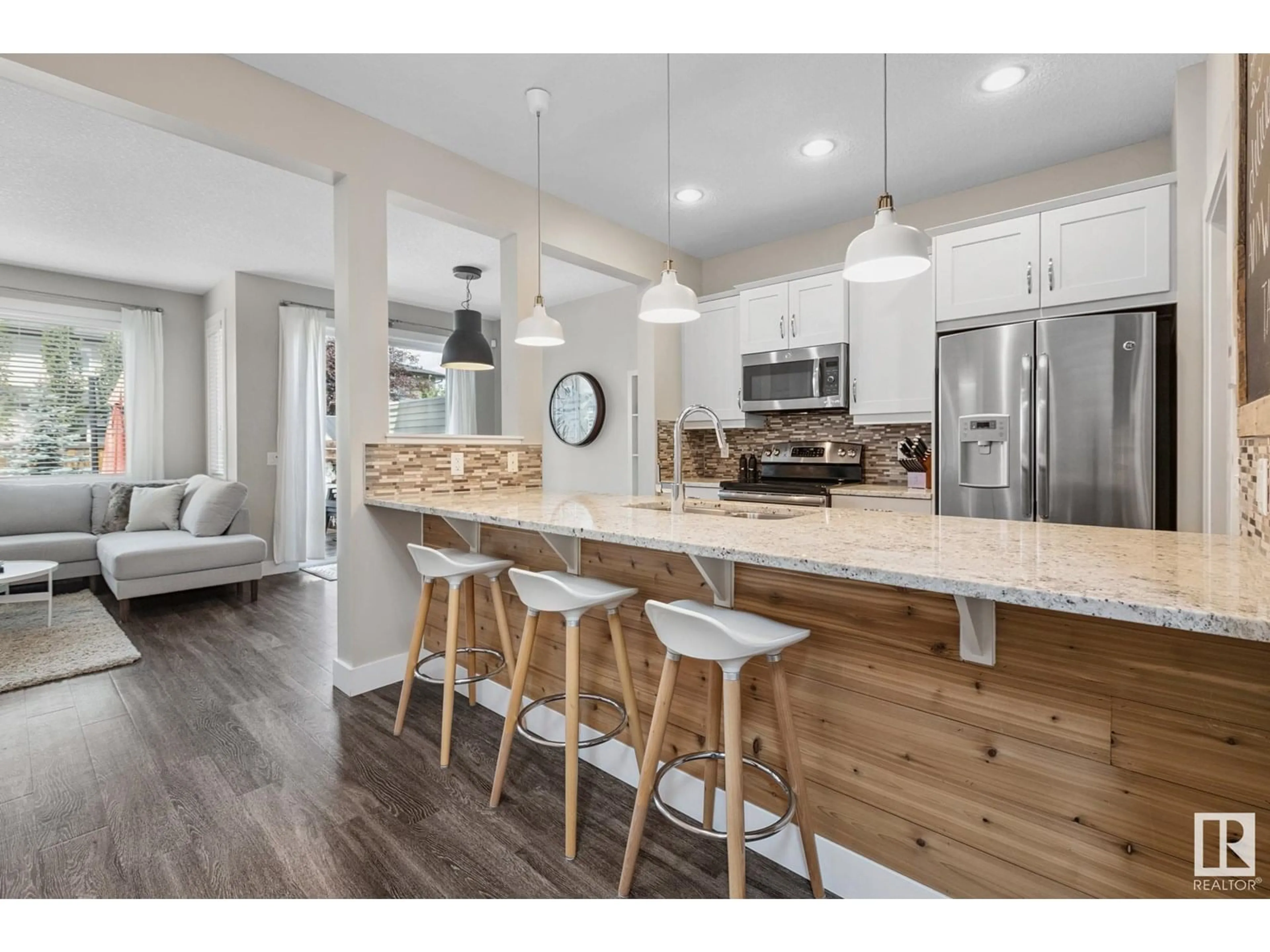 Open concept kitchen, wood/laminate floor for NW - 13020 205 ST, Edmonton Alberta T5S0J2