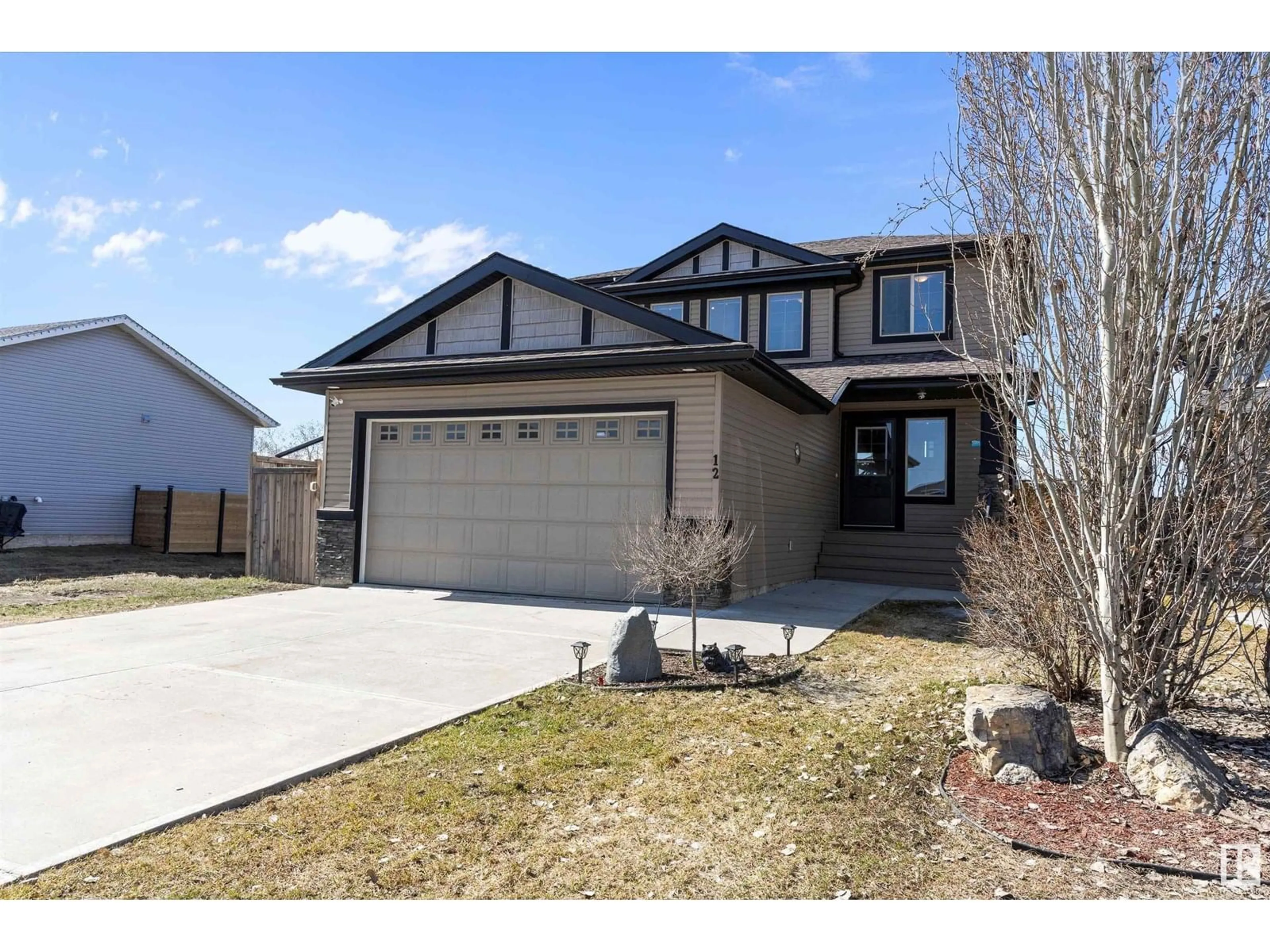 Home with vinyl exterior material, street for 12 SOUTHBRIDGE DR, Calmar Alberta T0C0V0