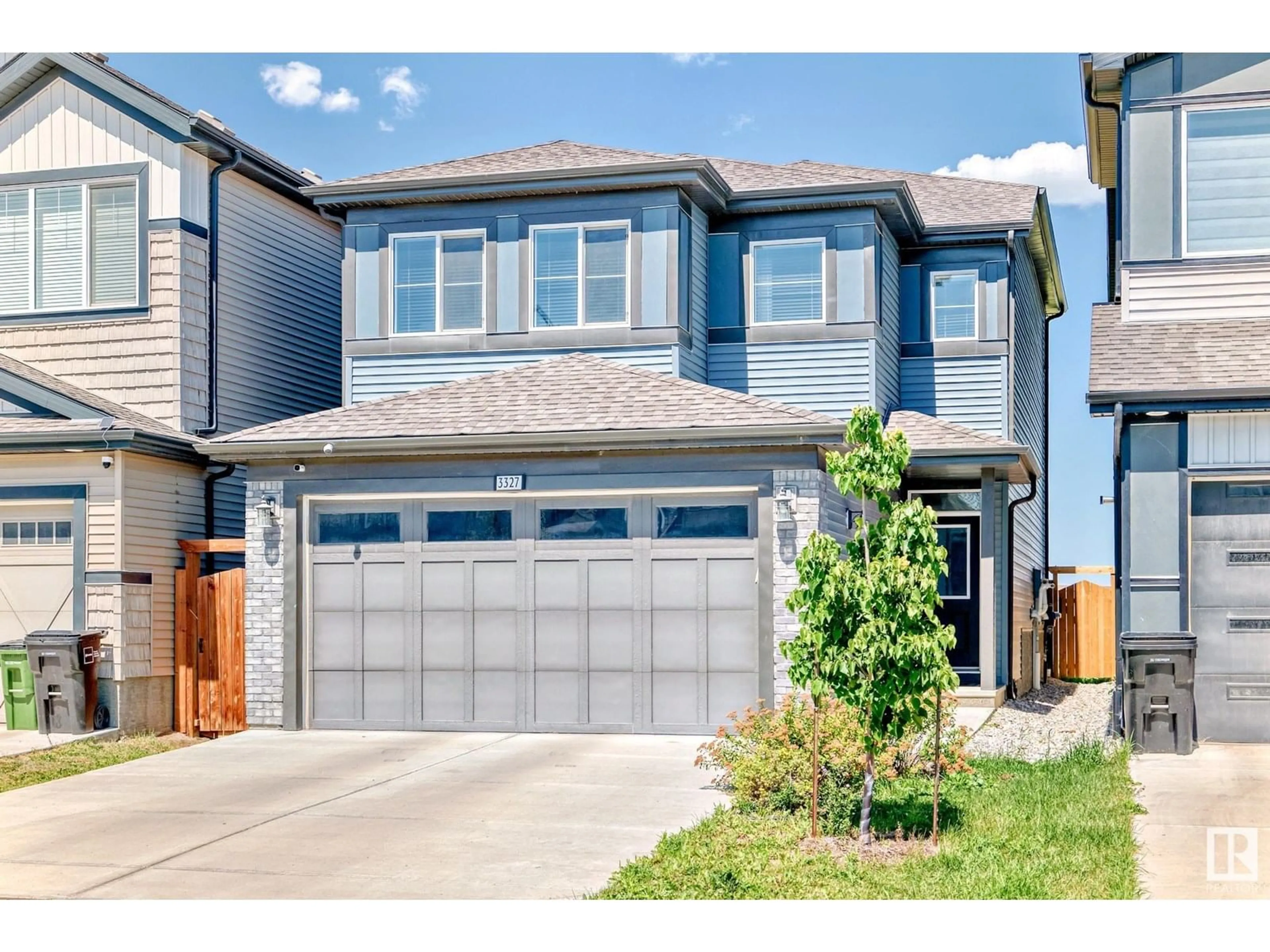 Home with vinyl exterior material, street for 3327 PARKER LO, Edmonton Alberta T6W4C2