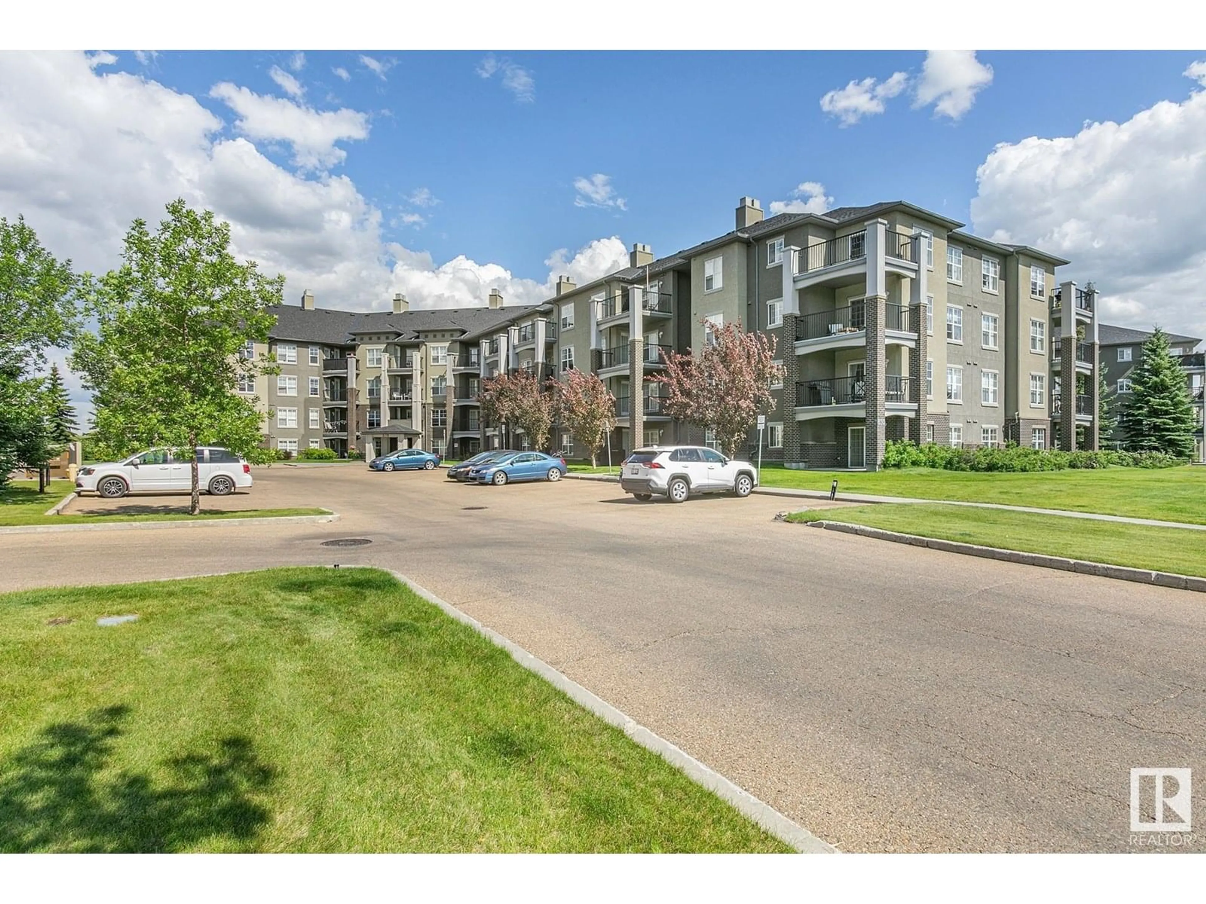 A pic from outside/outdoor area/front of a property/back of a property/a pic from drone, unknown for #112 - 630 MCALLISTER LO, Edmonton Alberta T6W1N3