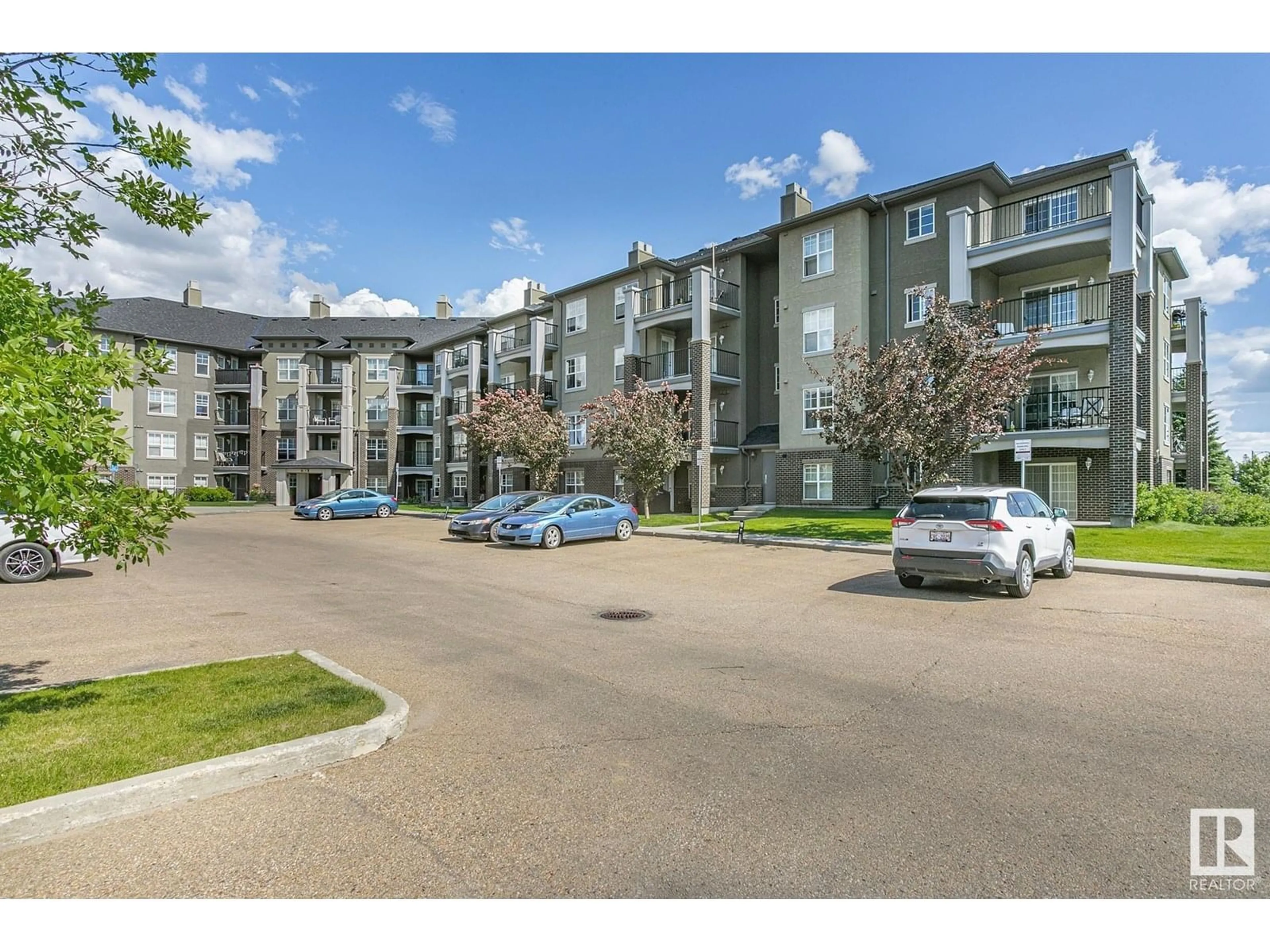 A pic from outside/outdoor area/front of a property/back of a property/a pic from drone, unknown for #112 - 630 MCALLISTER LO, Edmonton Alberta T6W1N3