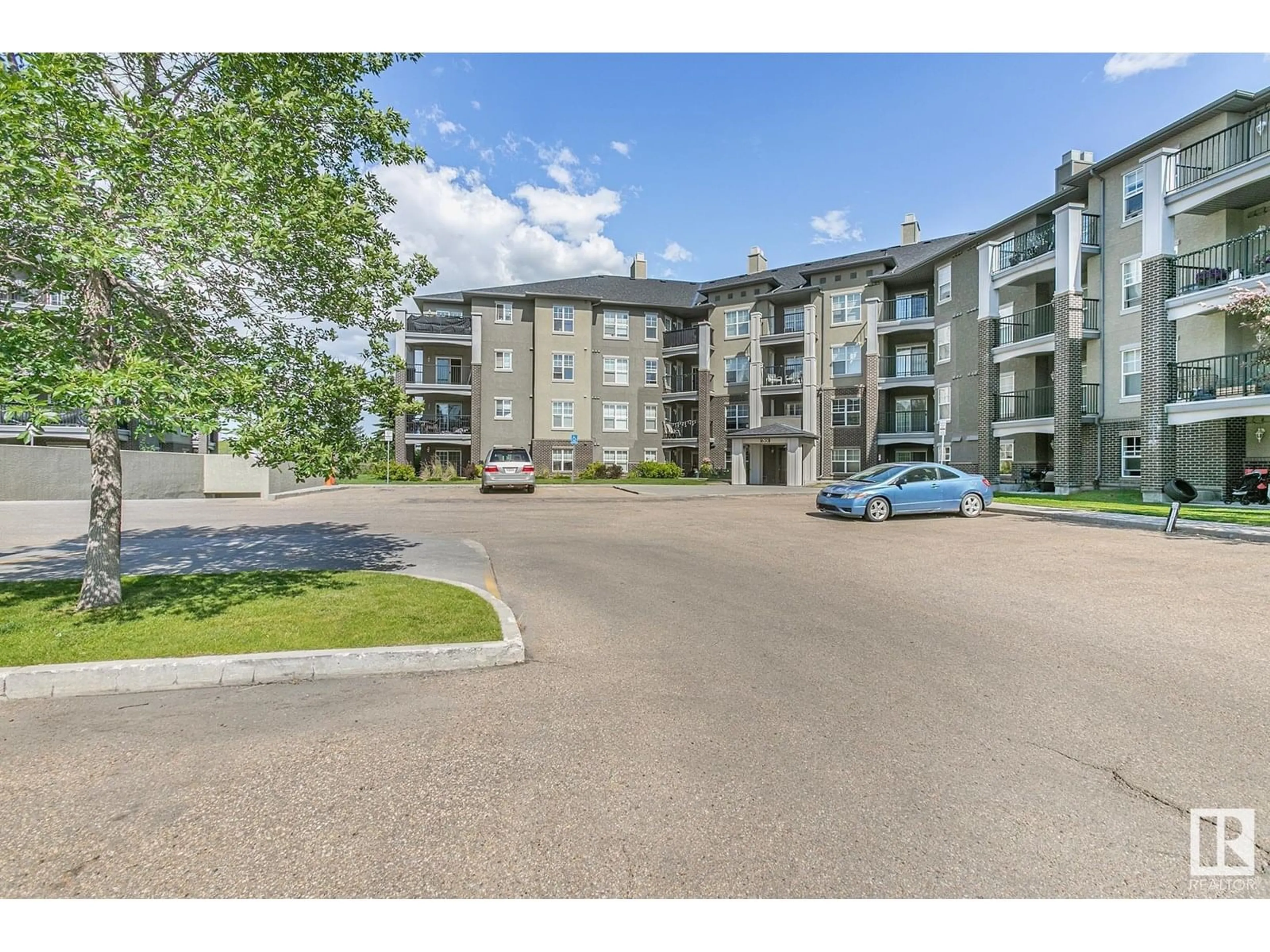 A pic from outside/outdoor area/front of a property/back of a property/a pic from drone, unknown for #112 - 630 MCALLISTER LO, Edmonton Alberta T6W1N3