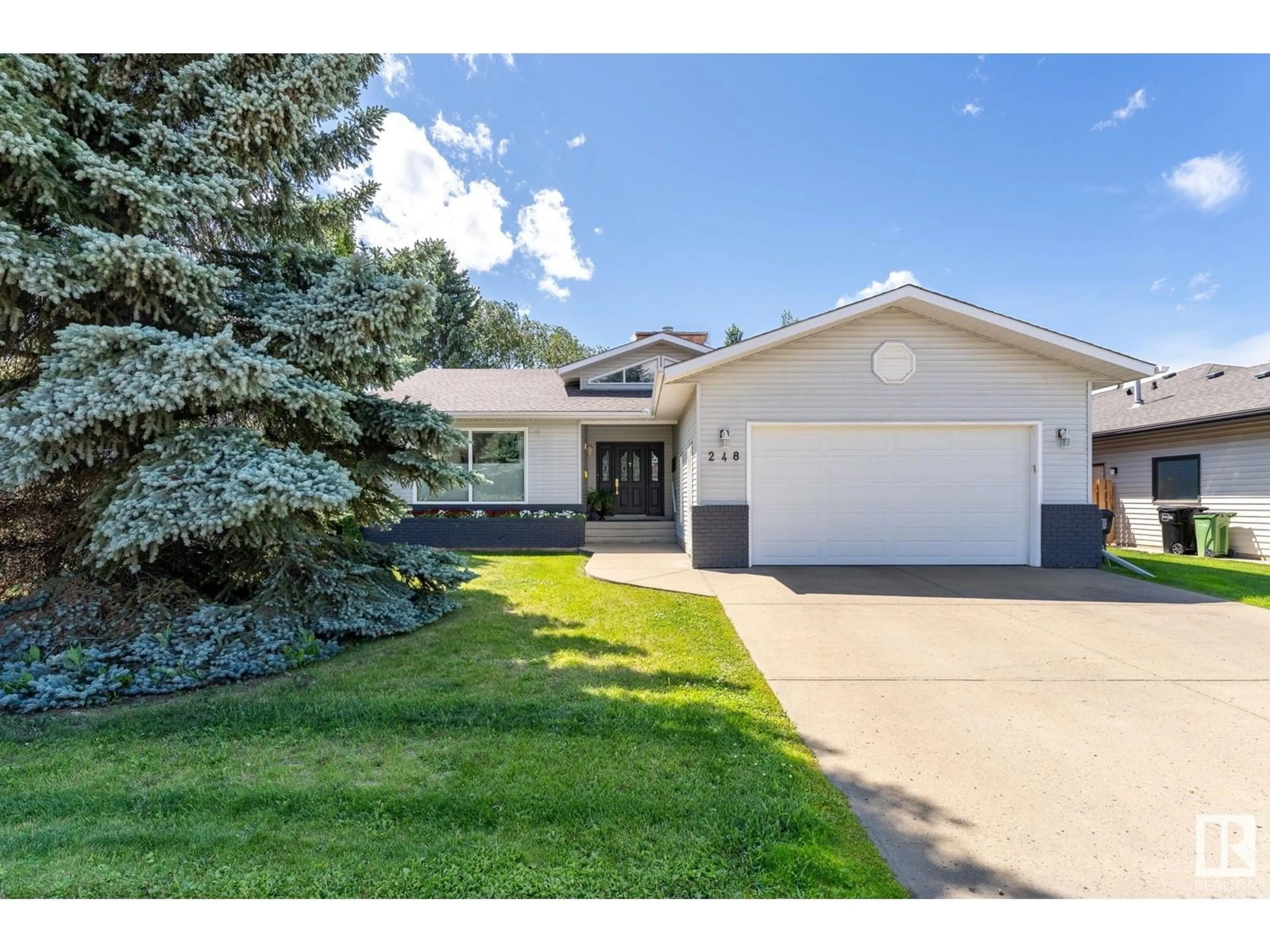 Home with vinyl exterior material, street for 248 WAYGOOD RD, Edmonton Alberta T5T5M3