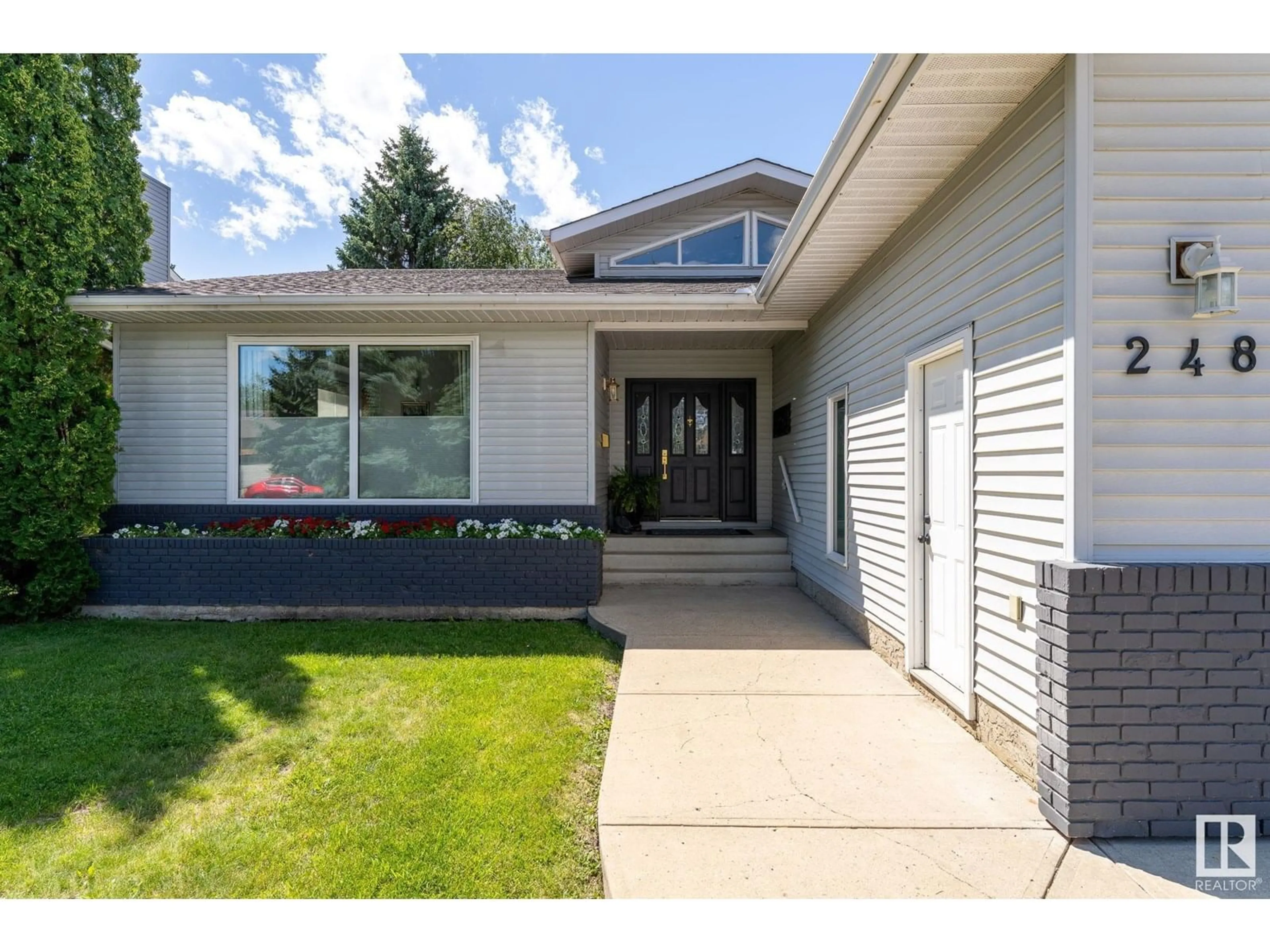 Home with vinyl exterior material, street for 248 WAYGOOD RD, Edmonton Alberta T5T5M3
