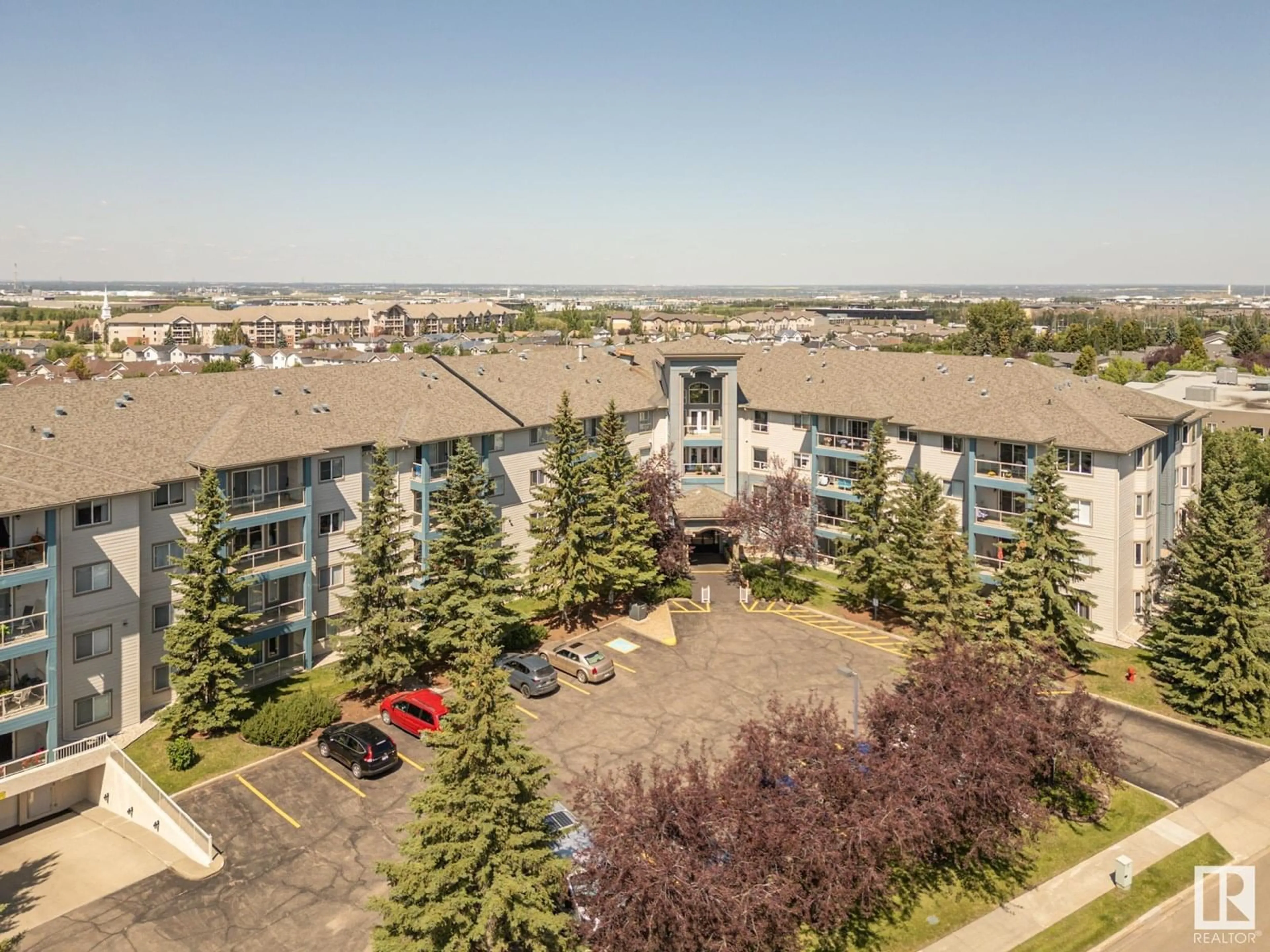 A pic from outside/outdoor area/front of a property/back of a property/a pic from drone, unknown for #203 - 70 CRYSTAL LN, Sherwood Park Alberta T8H1W6
