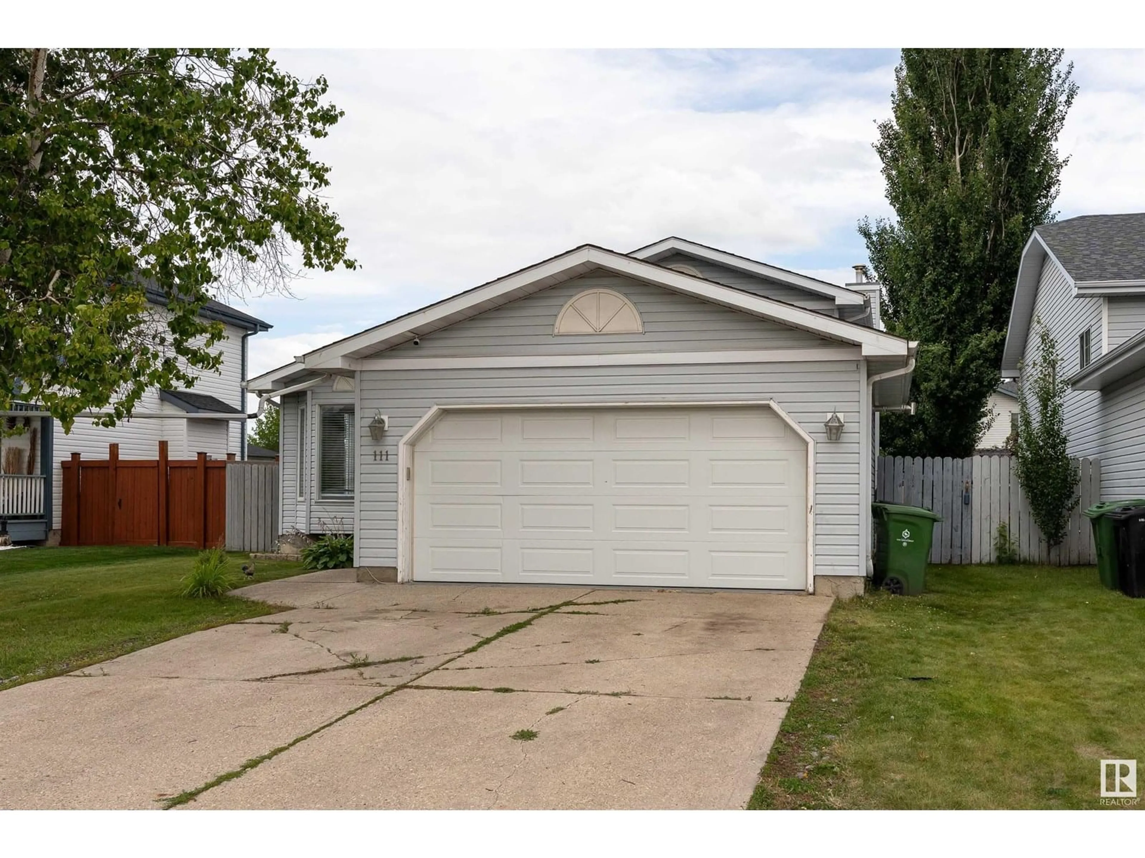Home with vinyl exterior material, street for 111 WESTMEWS, Fort Saskatchewan Alberta T8L3X7