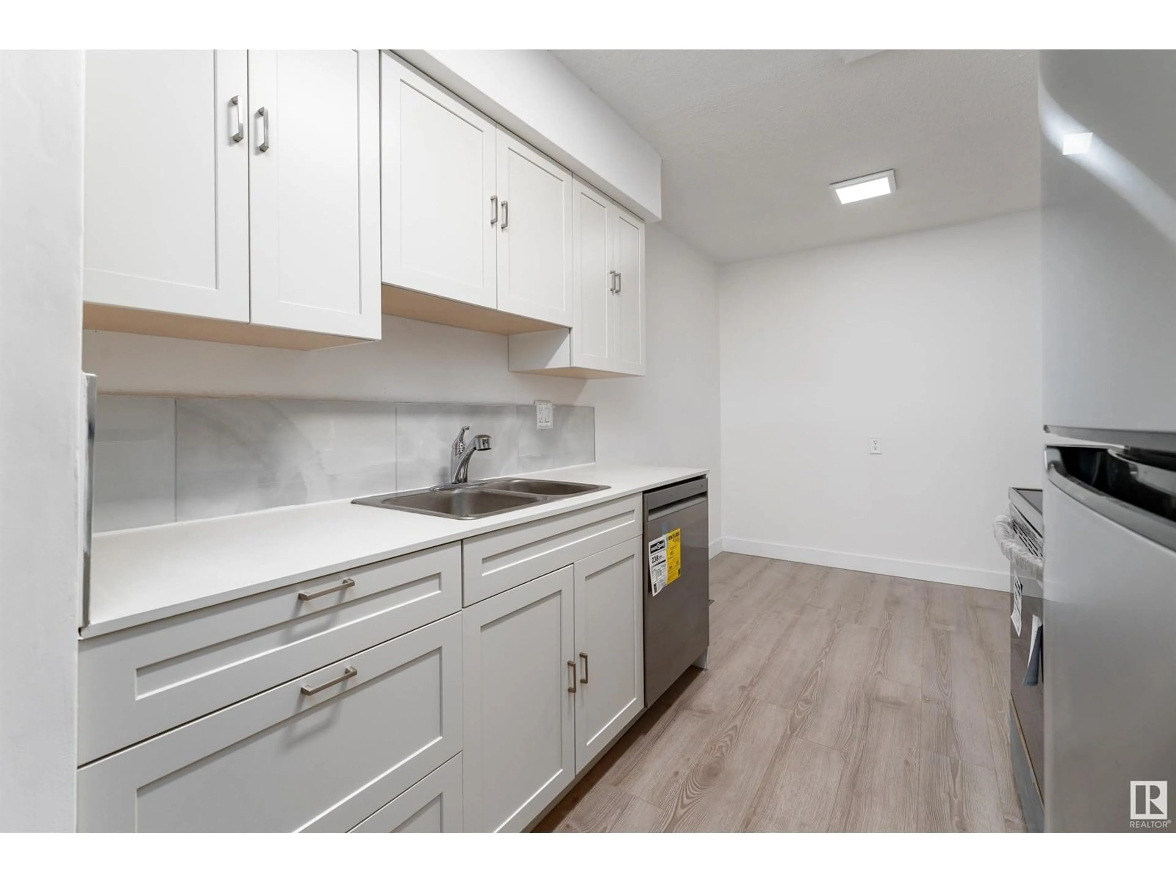 Standard kitchen, wood/laminate floor for #8 - 14230 80 ST, Edmonton Alberta T5C1L6