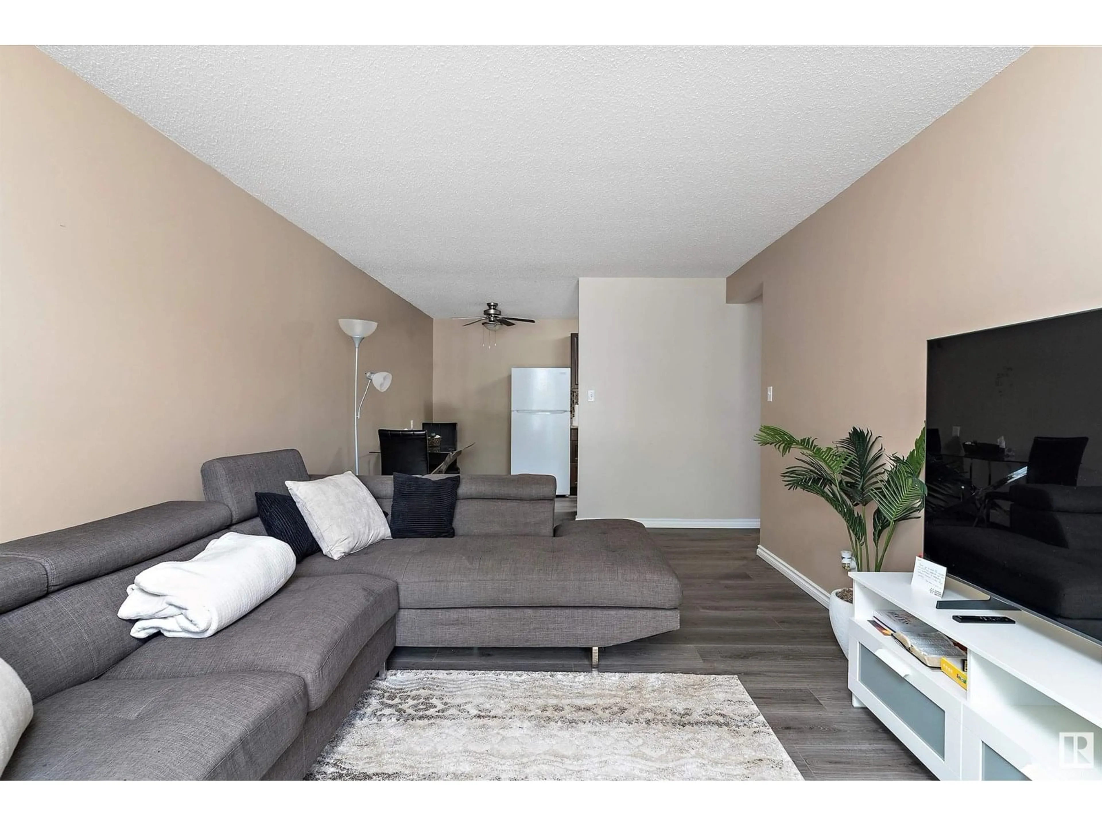 Living room with furniture, wood/laminate floor for #206 - 10330 113 ST, Edmonton Alberta T5K1P6