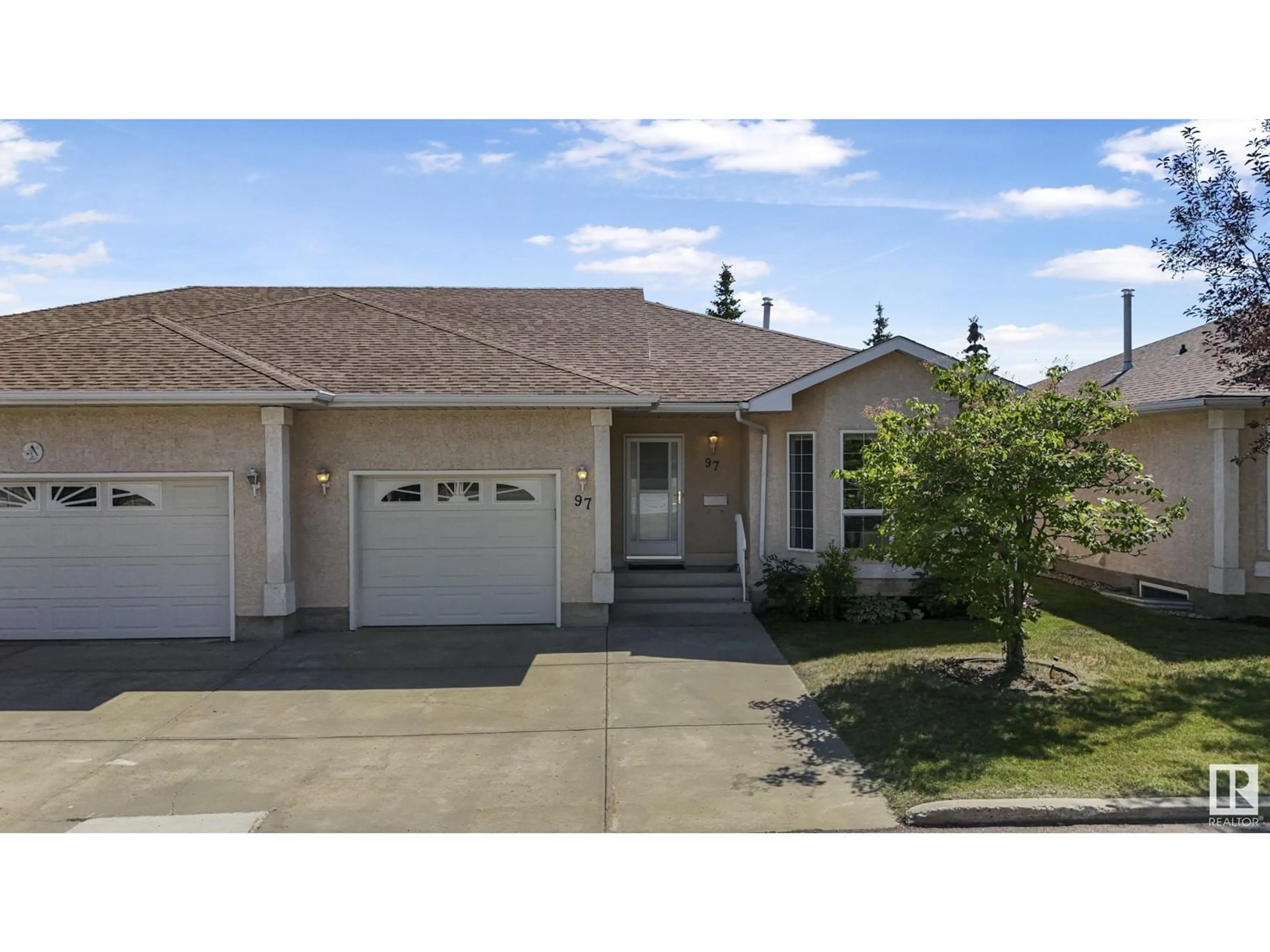 Home with vinyl exterior material, street for 13320 - 97 124 ST, Edmonton Alberta T5L5B7