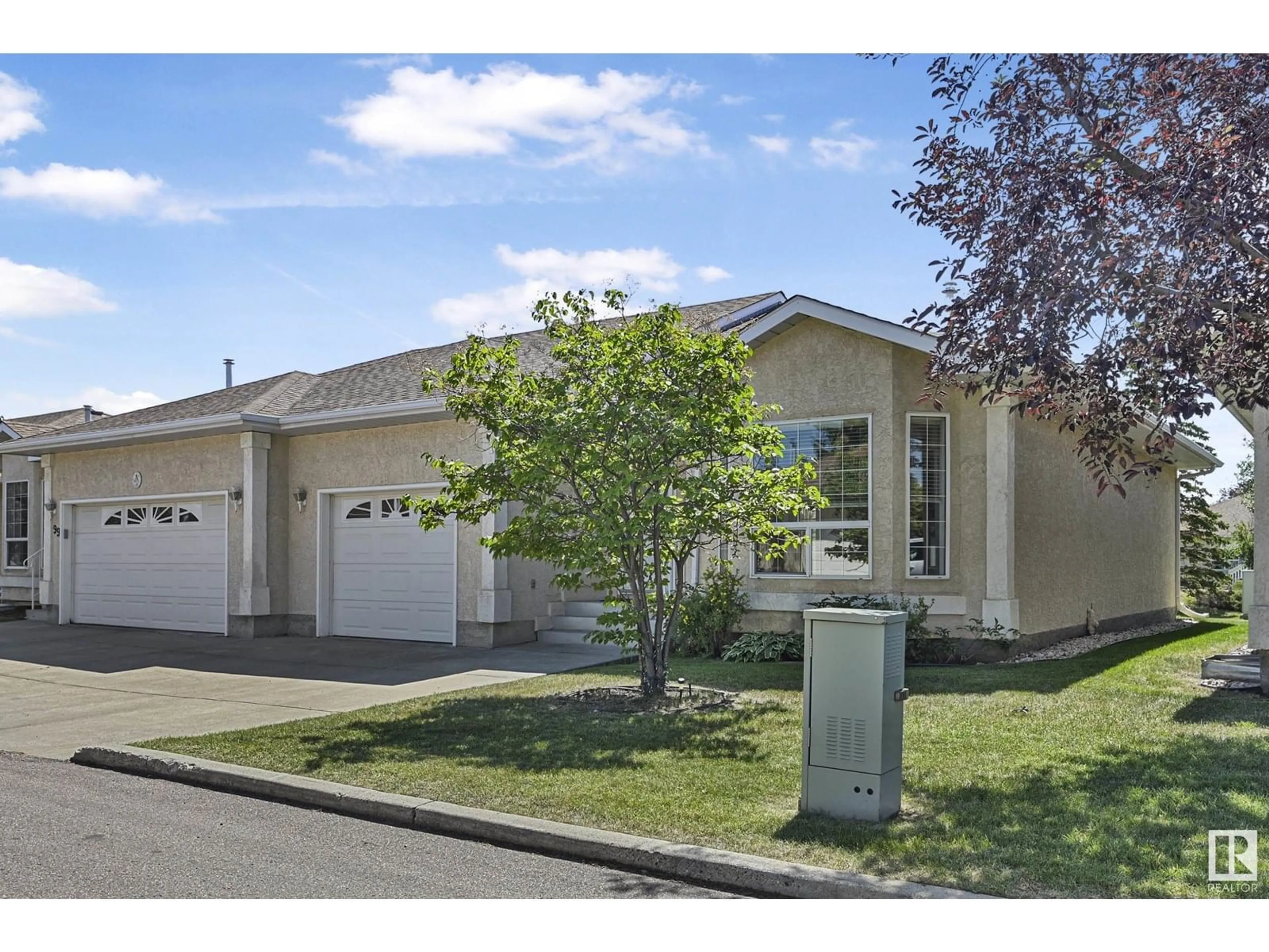 Home with vinyl exterior material, street for 13320 - 97 124 ST, Edmonton Alberta T5L5B7