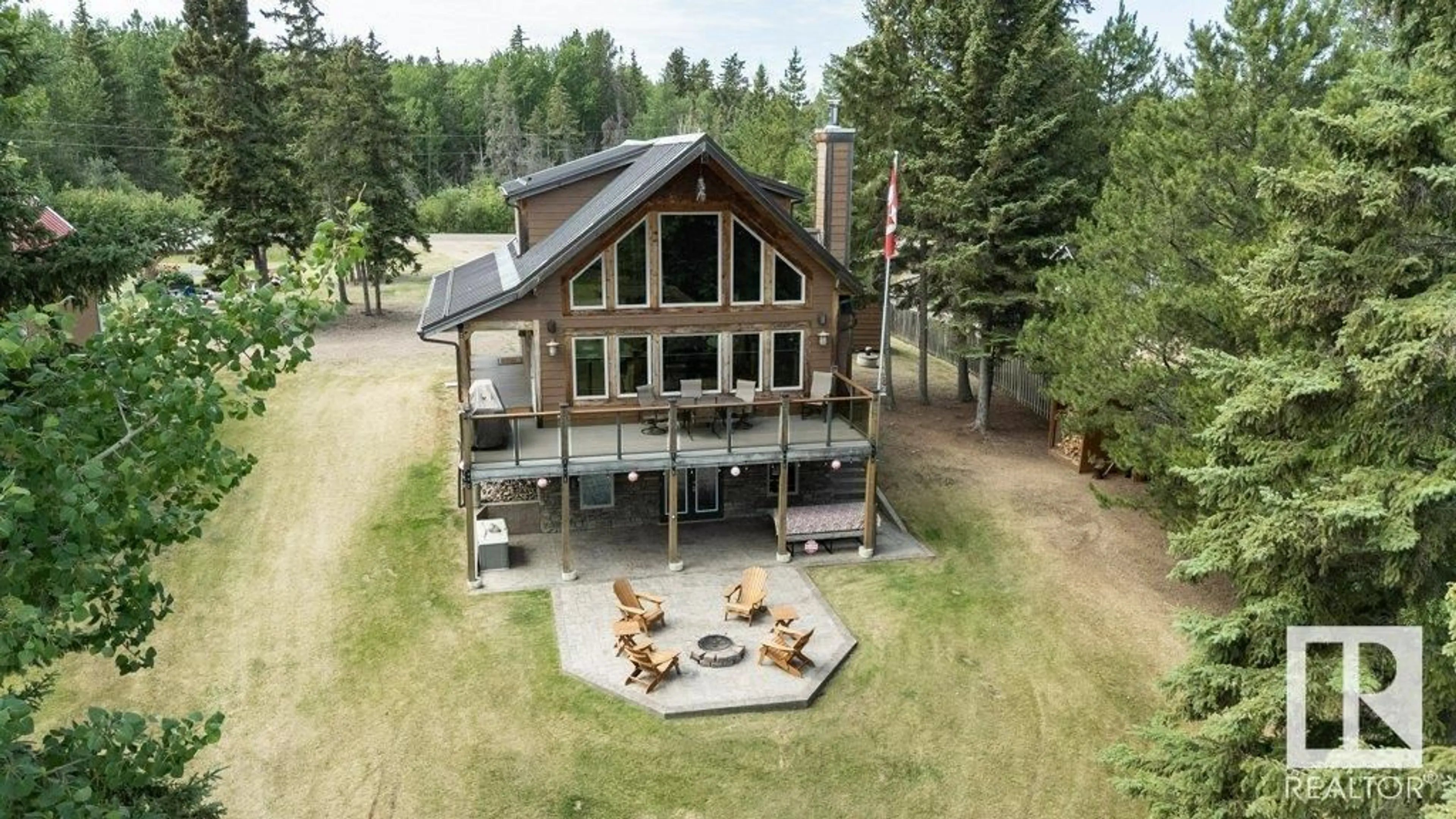 A pic from outside/outdoor area/front of a property/back of a property/a pic from drone, unknown for 15156 - 326 OLD TRAIL, Rural Lac La Biche County Alberta T0A2C2