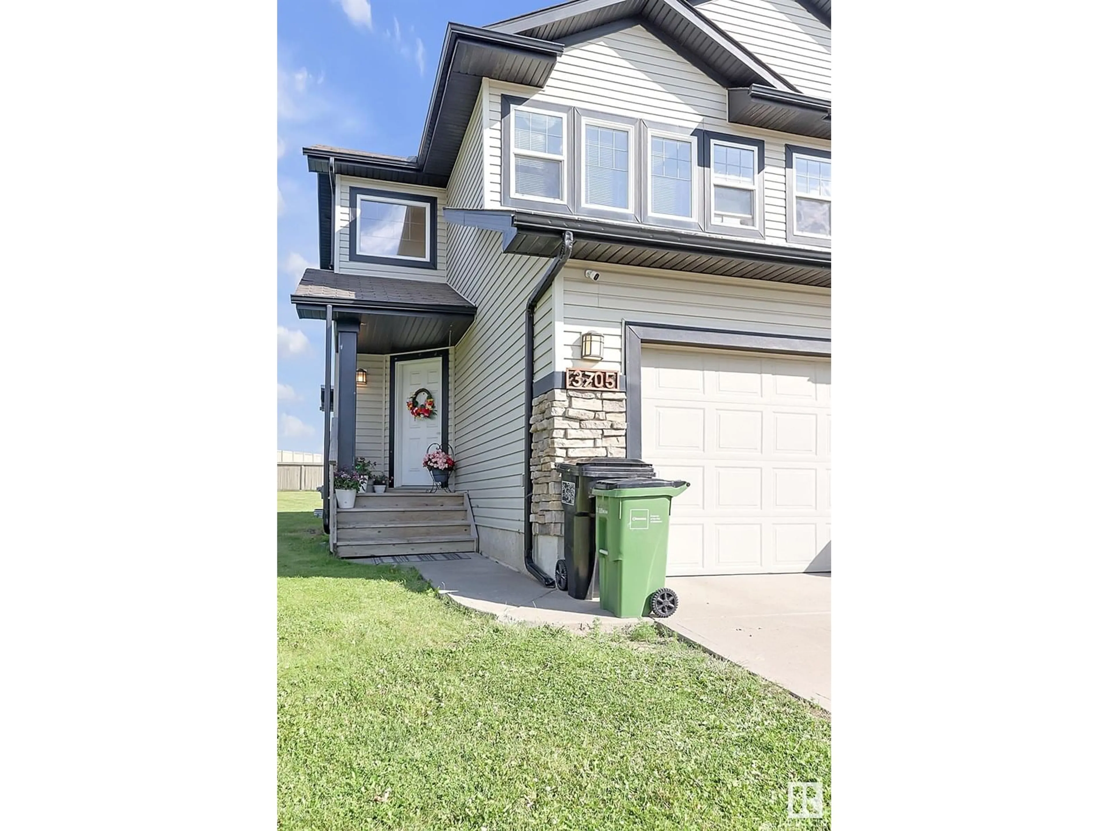 Home with vinyl exterior material, street for 3705 11 ST, Edmonton Alberta T6T0E8