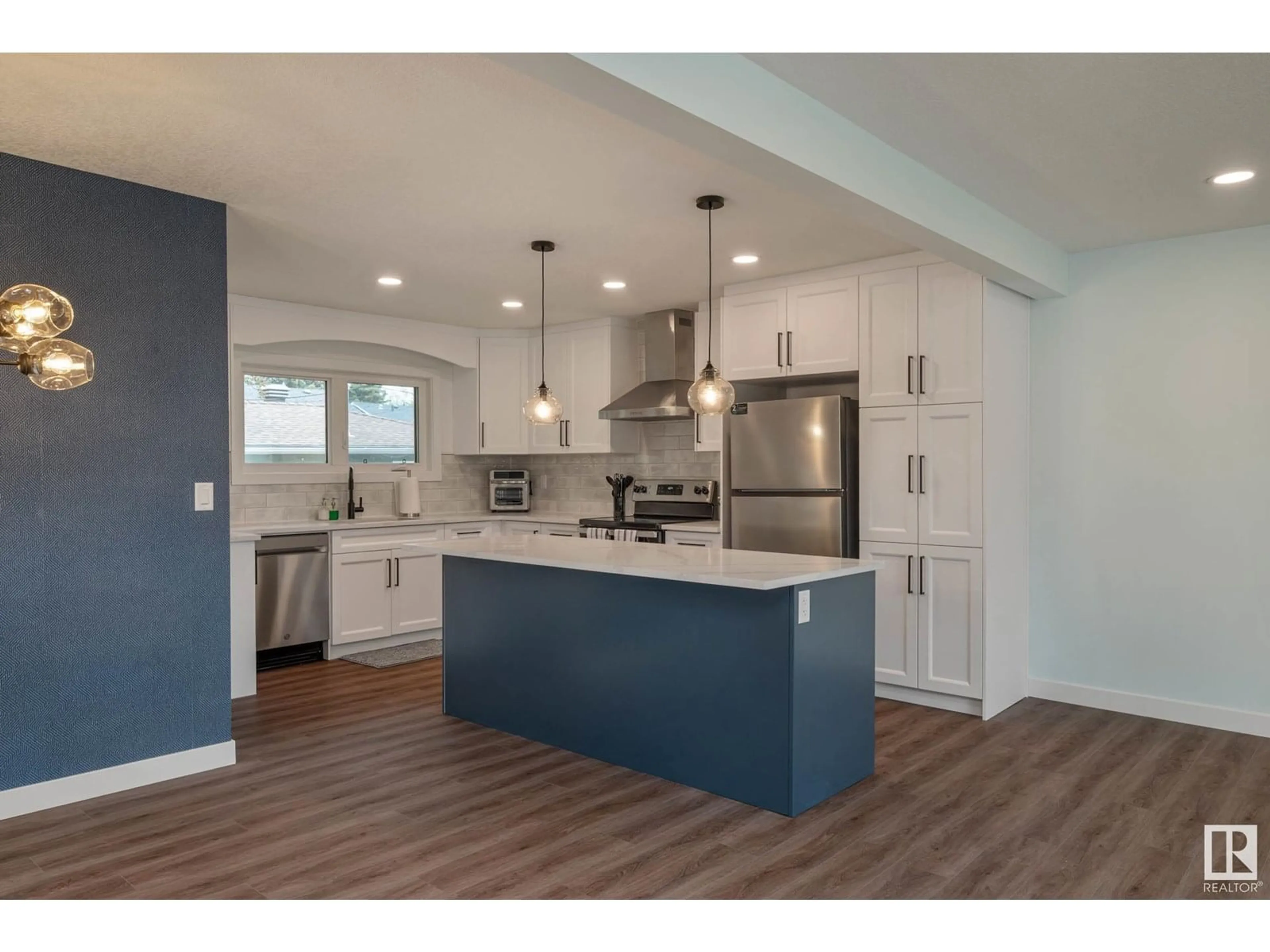 Open concept kitchen, wood/laminate floor for 14622 95 AV, Edmonton Alberta T5N0B3