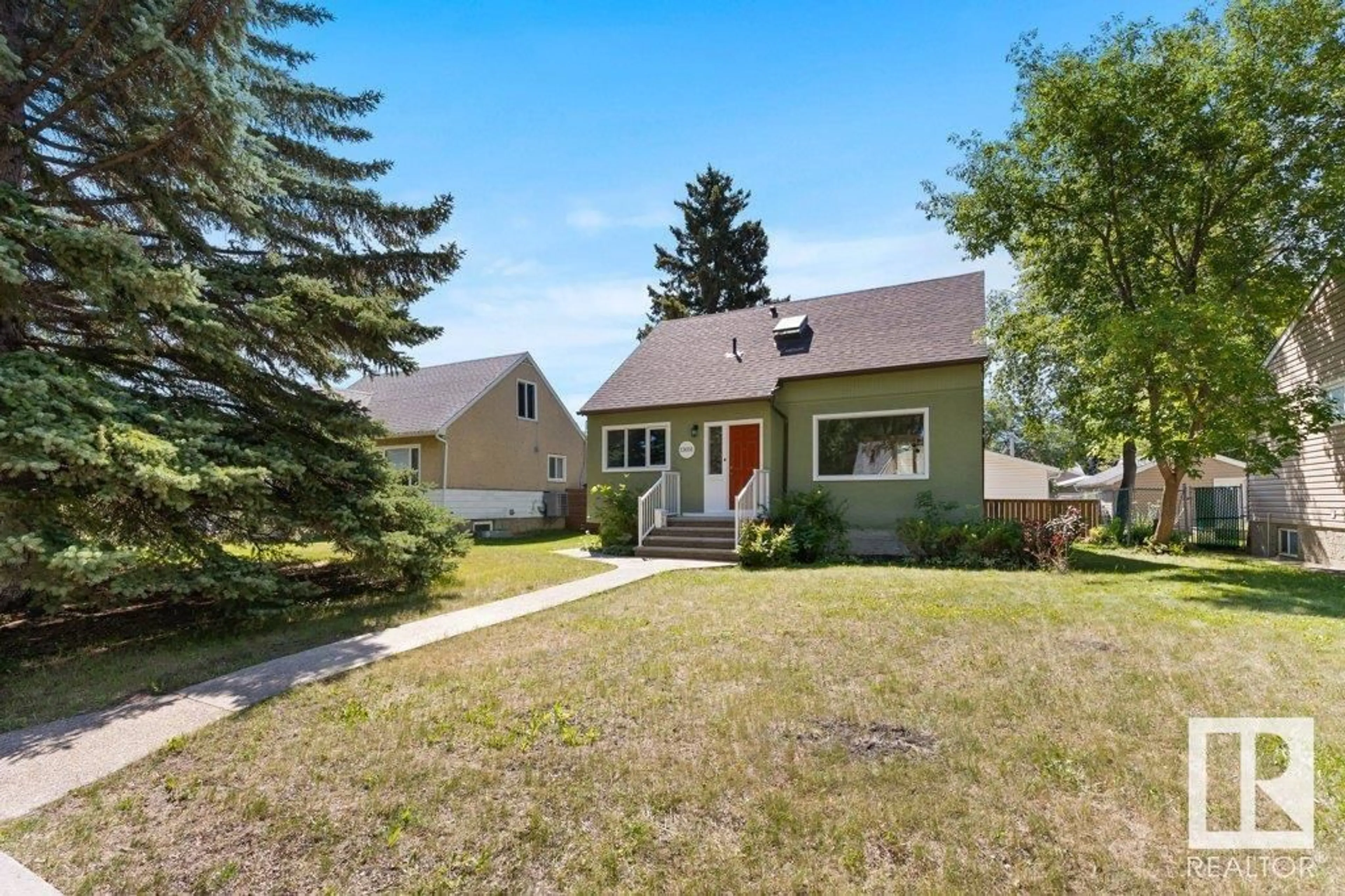 Home with vinyl exterior material, street for NW - 13031 123A AV, Edmonton Alberta T5L2Y8