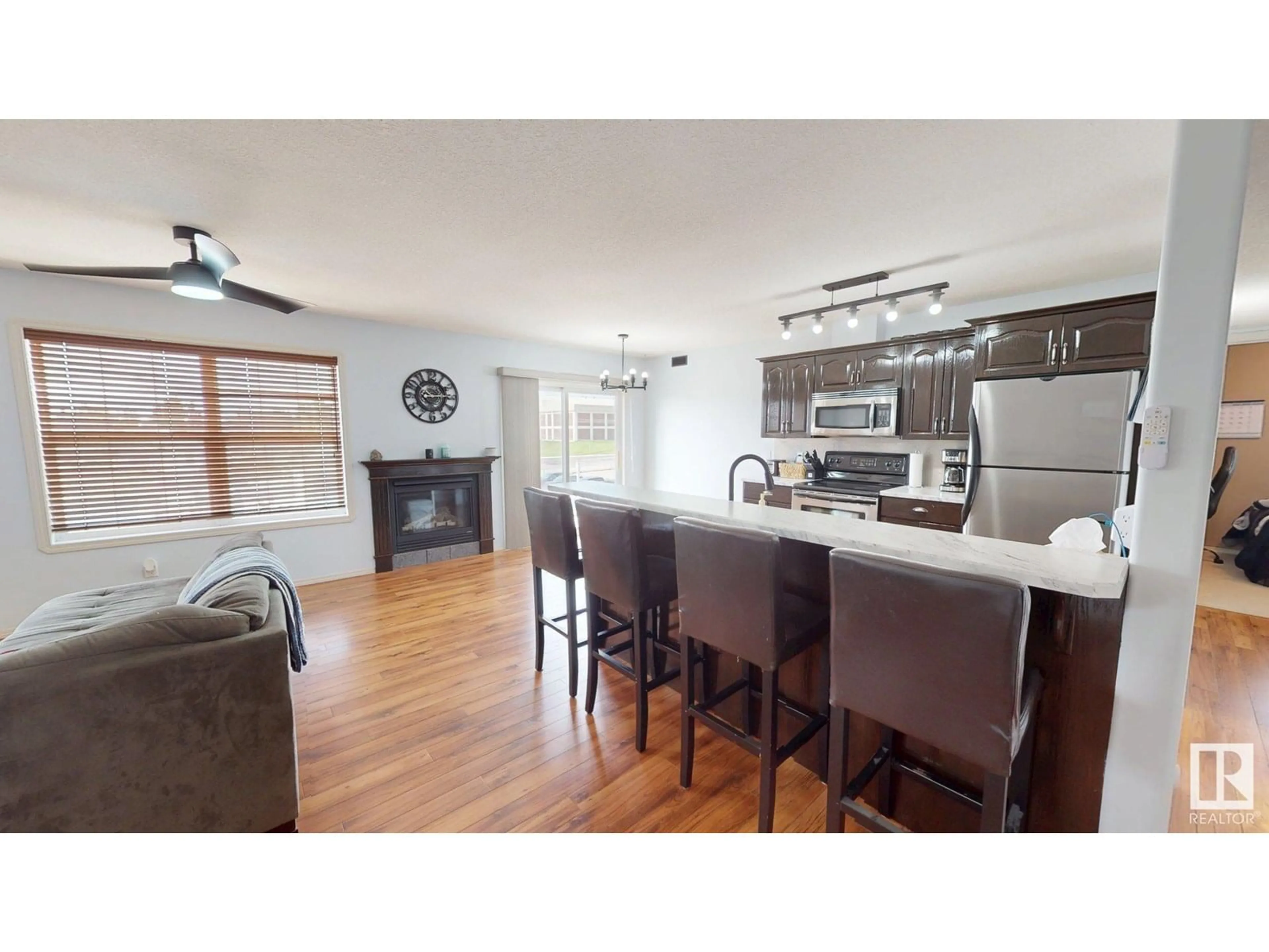Open concept kitchen, wood/laminate floor for 304 - 4102 50 AV, Drayton Valley Alberta T7A0A3