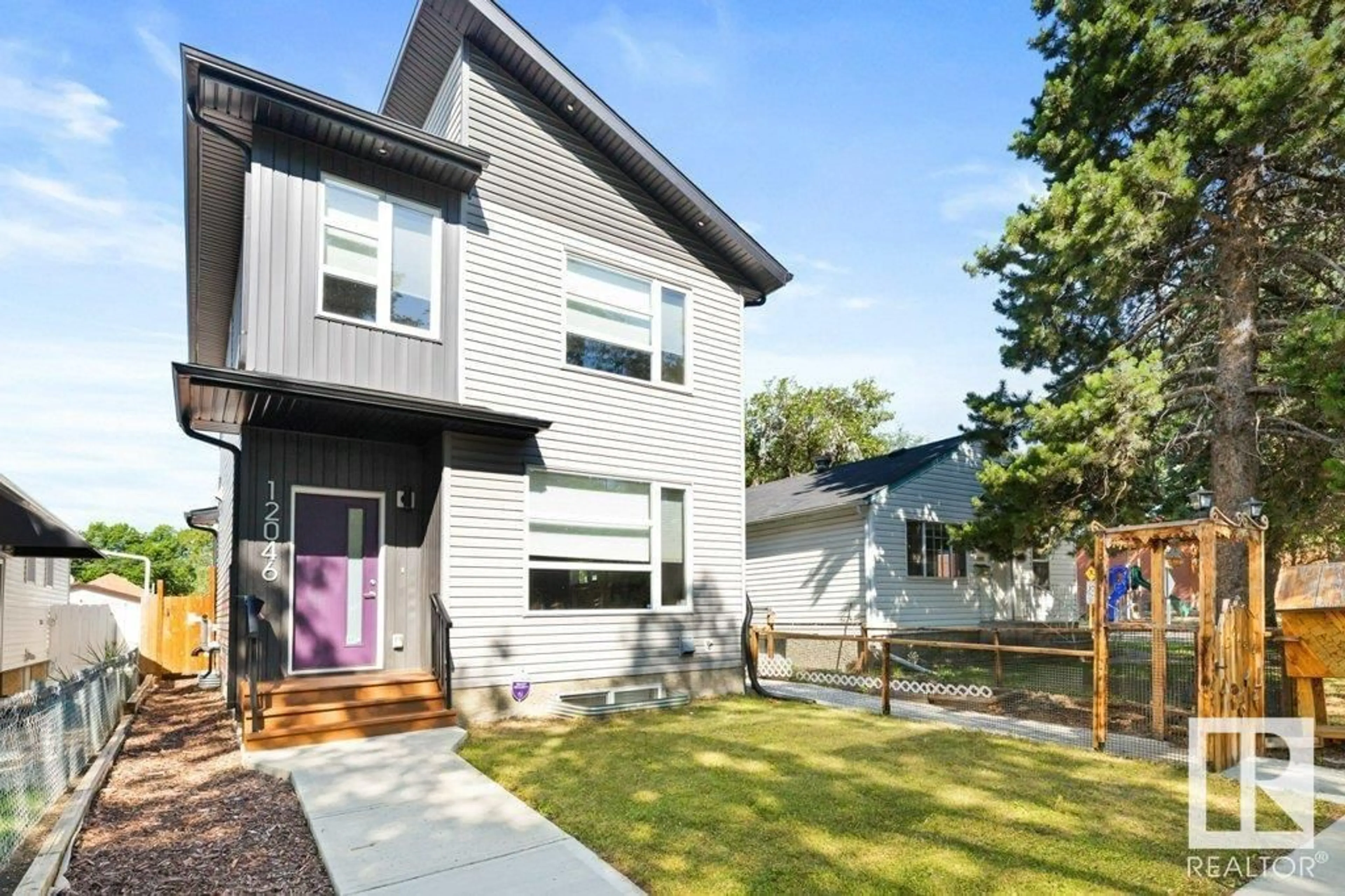 Home with vinyl exterior material, street for NW - 12046 89 ST, Edmonton Alberta T5B3W1