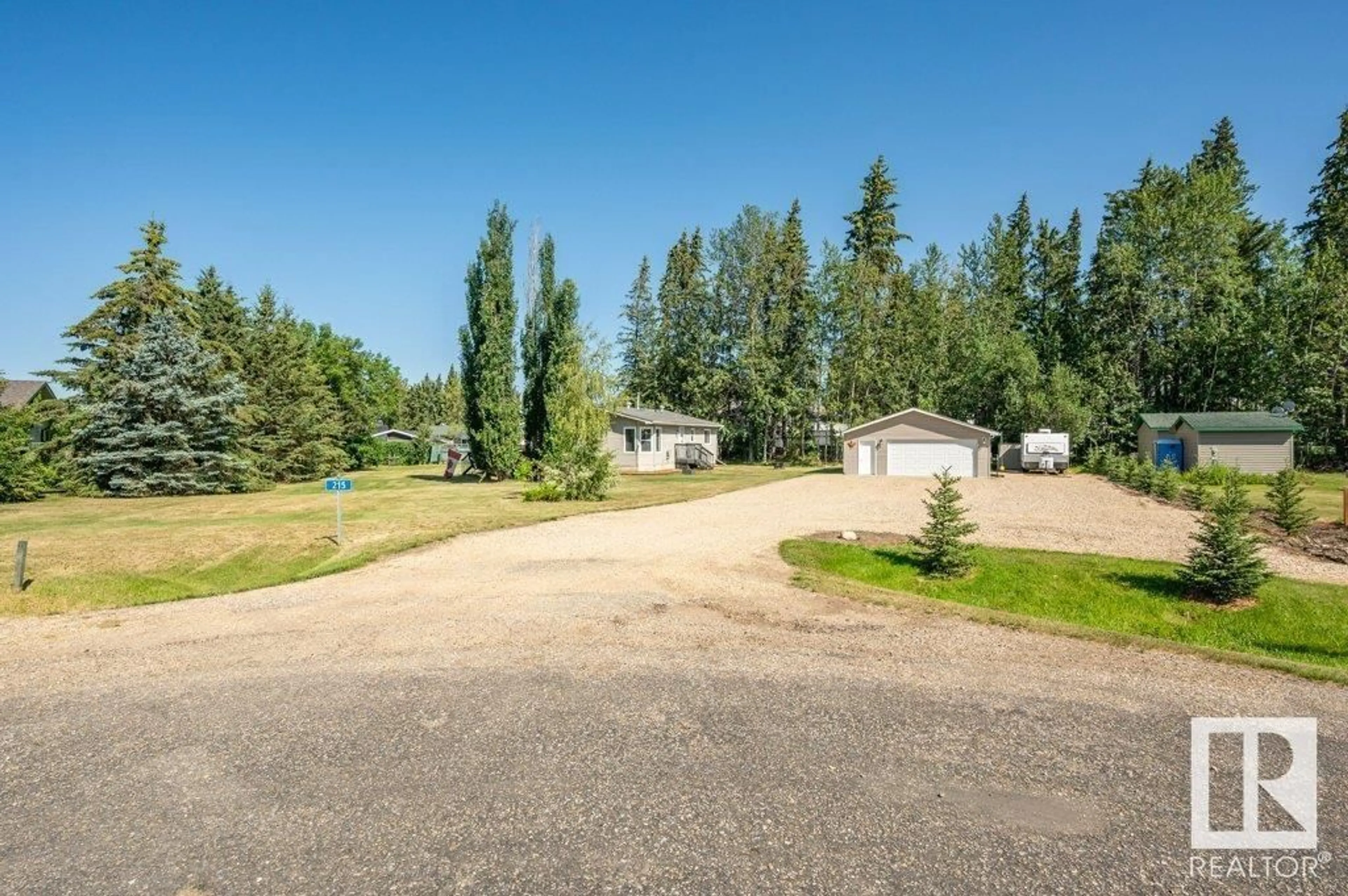 A pic from outside/outdoor area/front of a property/back of a property/a pic from drone, unknown for 215 LABONTE DRIVE, Rural Athabasca County Alberta T0A0M0