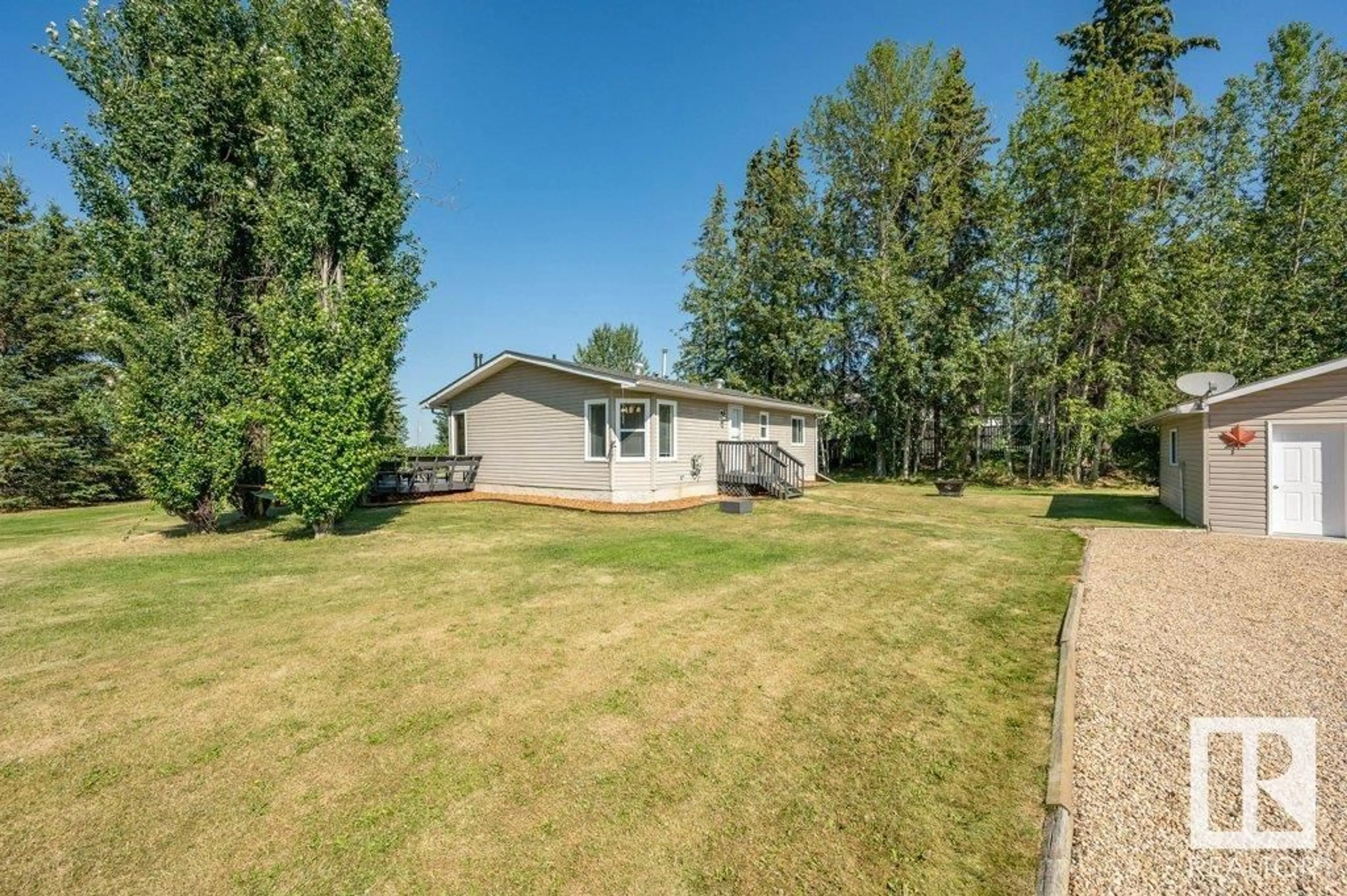 A pic from outside/outdoor area/front of a property/back of a property/a pic from drone, unknown for 215 LABONTE DRIVE, Rural Athabasca County Alberta T0A0M0