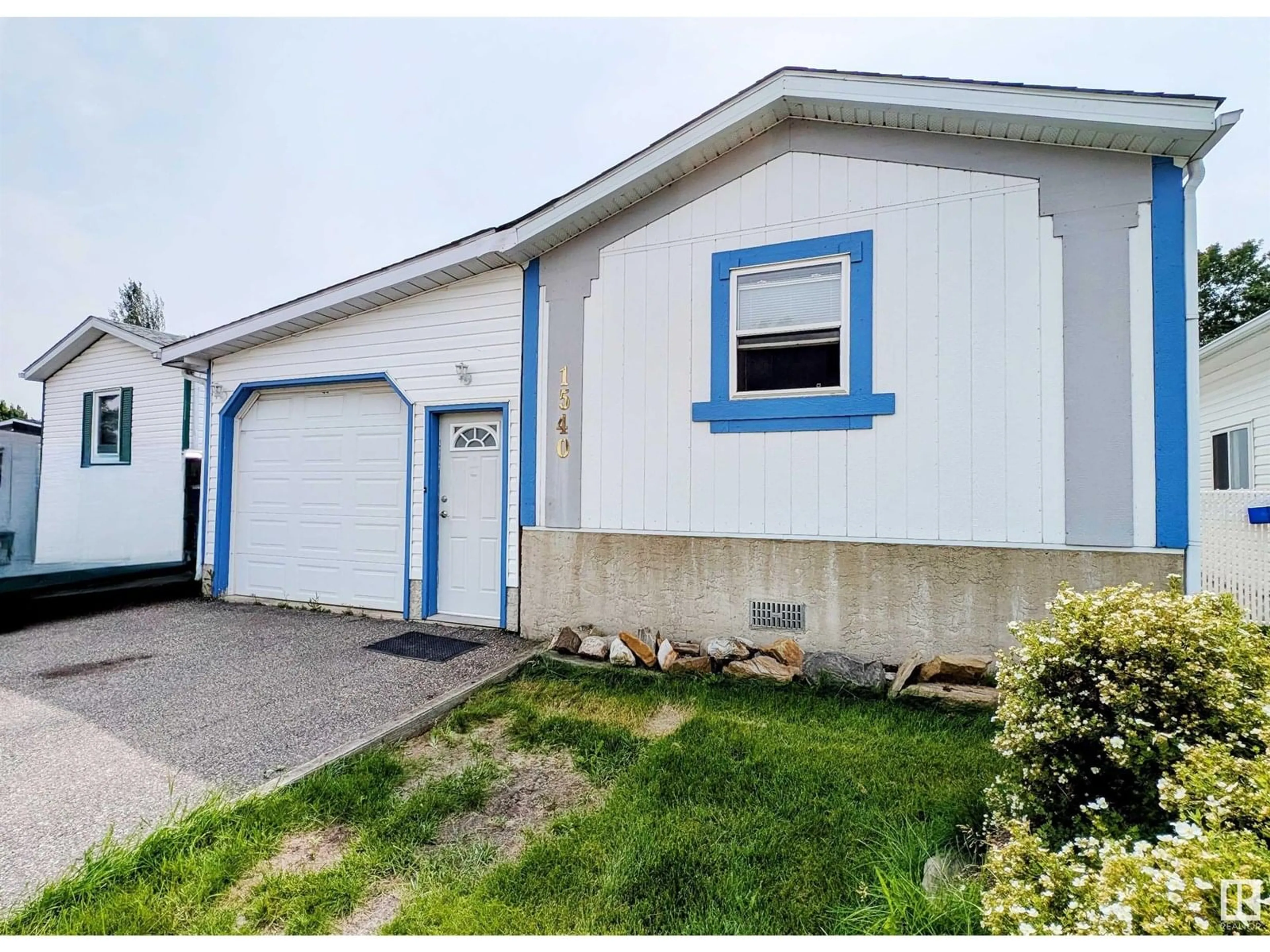 Home with vinyl exterior material, street for 1540 JUBILEE, Sherwood Park Alberta T8H1V2