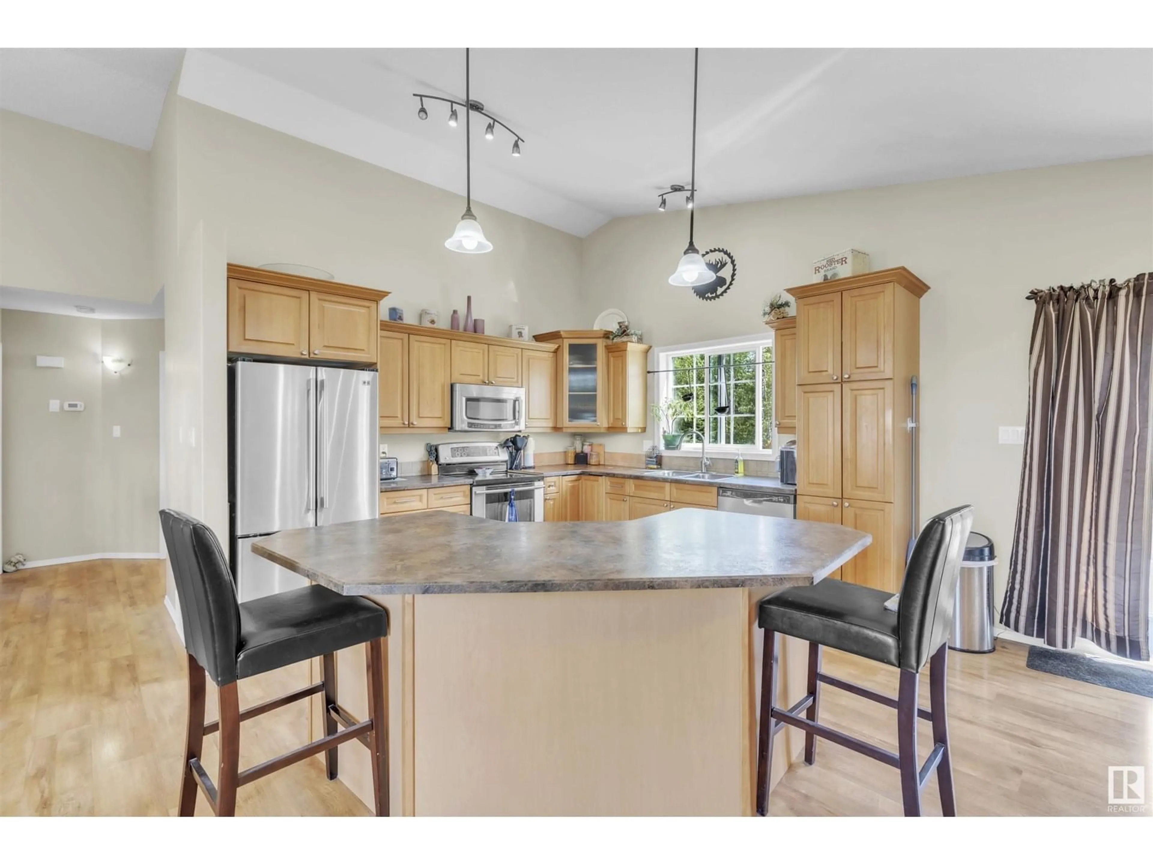 Open concept kitchen, ceramic/tile floor for 63319 - 10 RGE RD 435, Rural Bonnyville M.D. Alberta T9M1P1