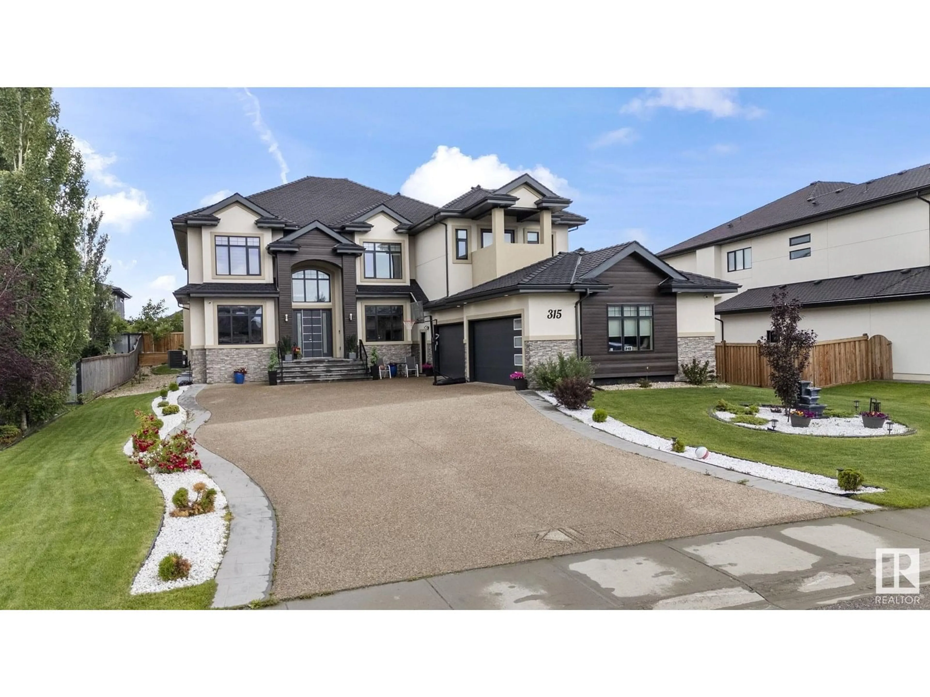 Home with vinyl exterior material, street for 52327 - 315 RGE ROAD 233, Rural Strathcona County Alberta T8B1C6