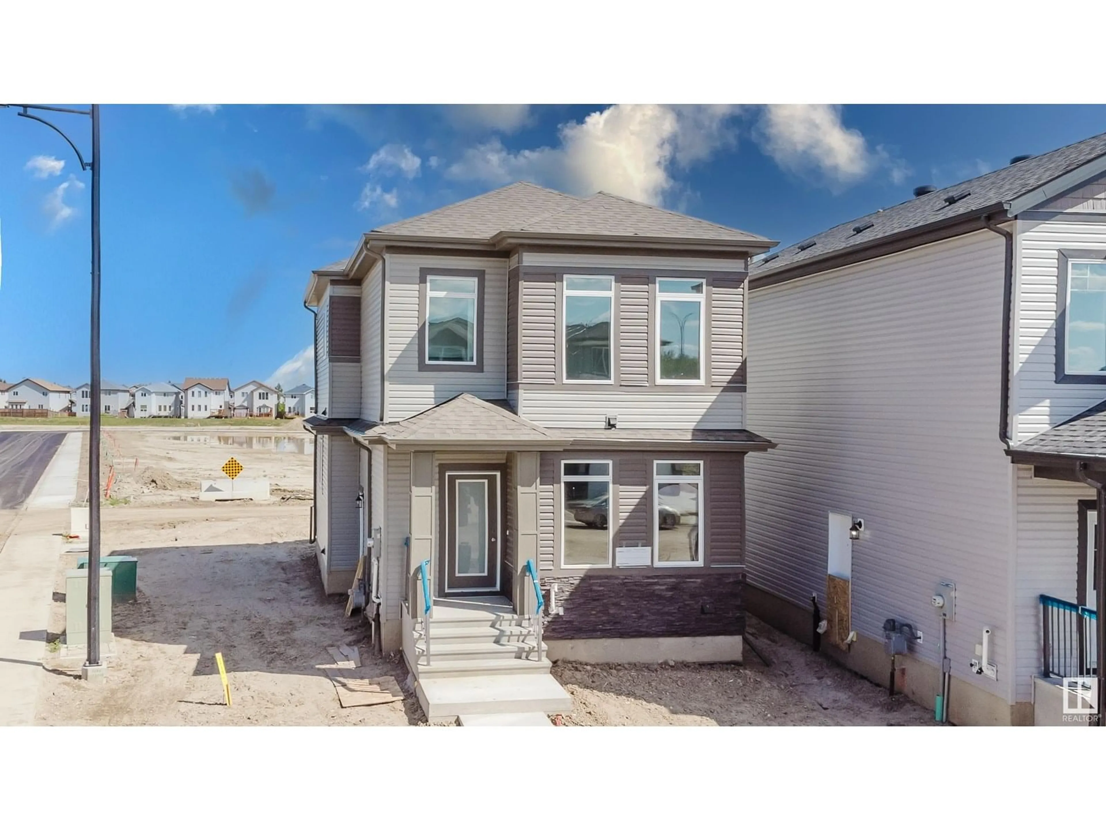A pic from outside/outdoor area/front of a property/back of a property/a pic from drone, street for 261 MUNN WY, Leduc Alberta T9E0S9