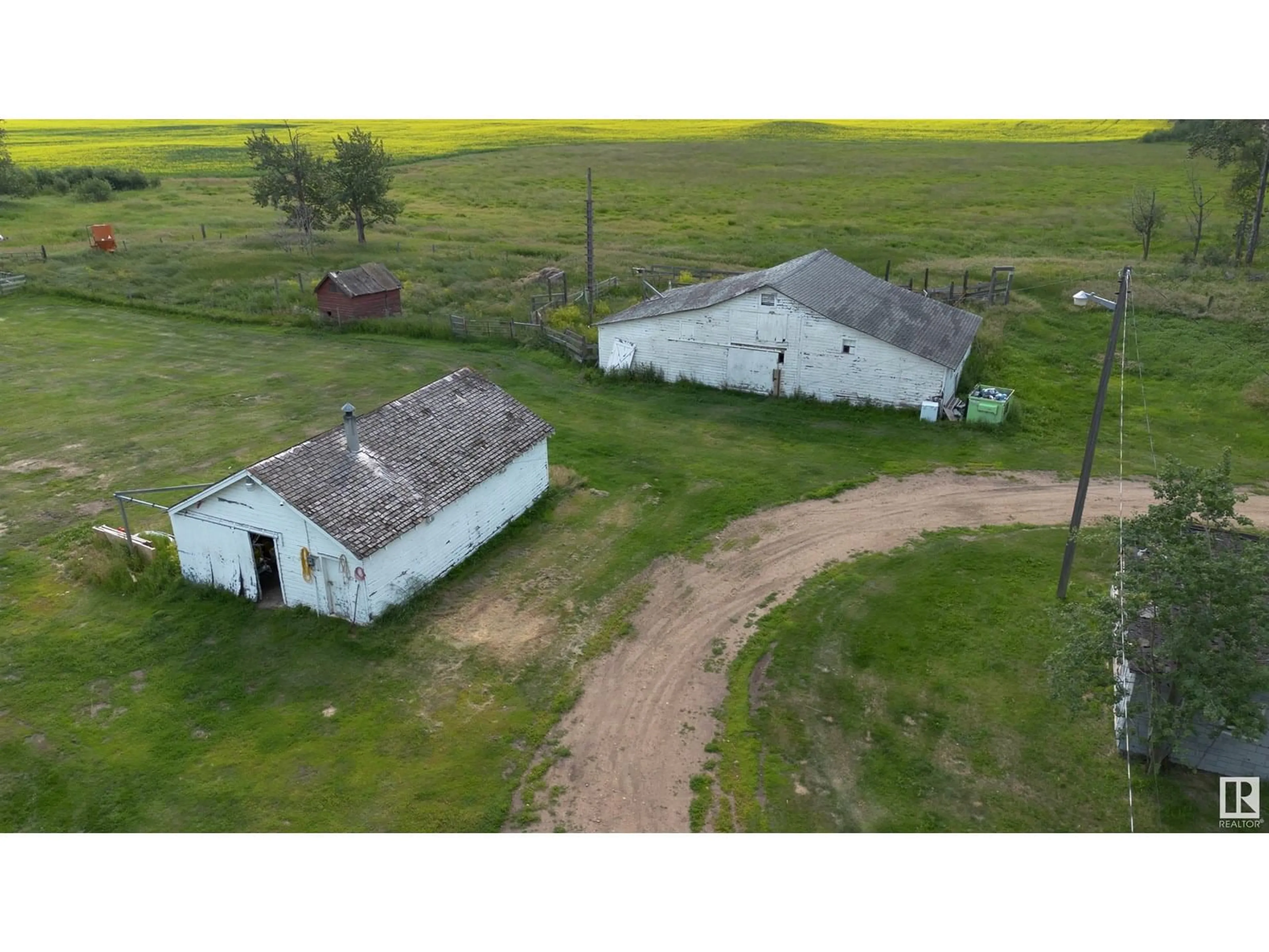 A pic from outside/outdoor area/front of a property/back of a property/a pic from drone, building for 25019 TWP RD 614 A, Rural Westlock County Alberta T0G1S0