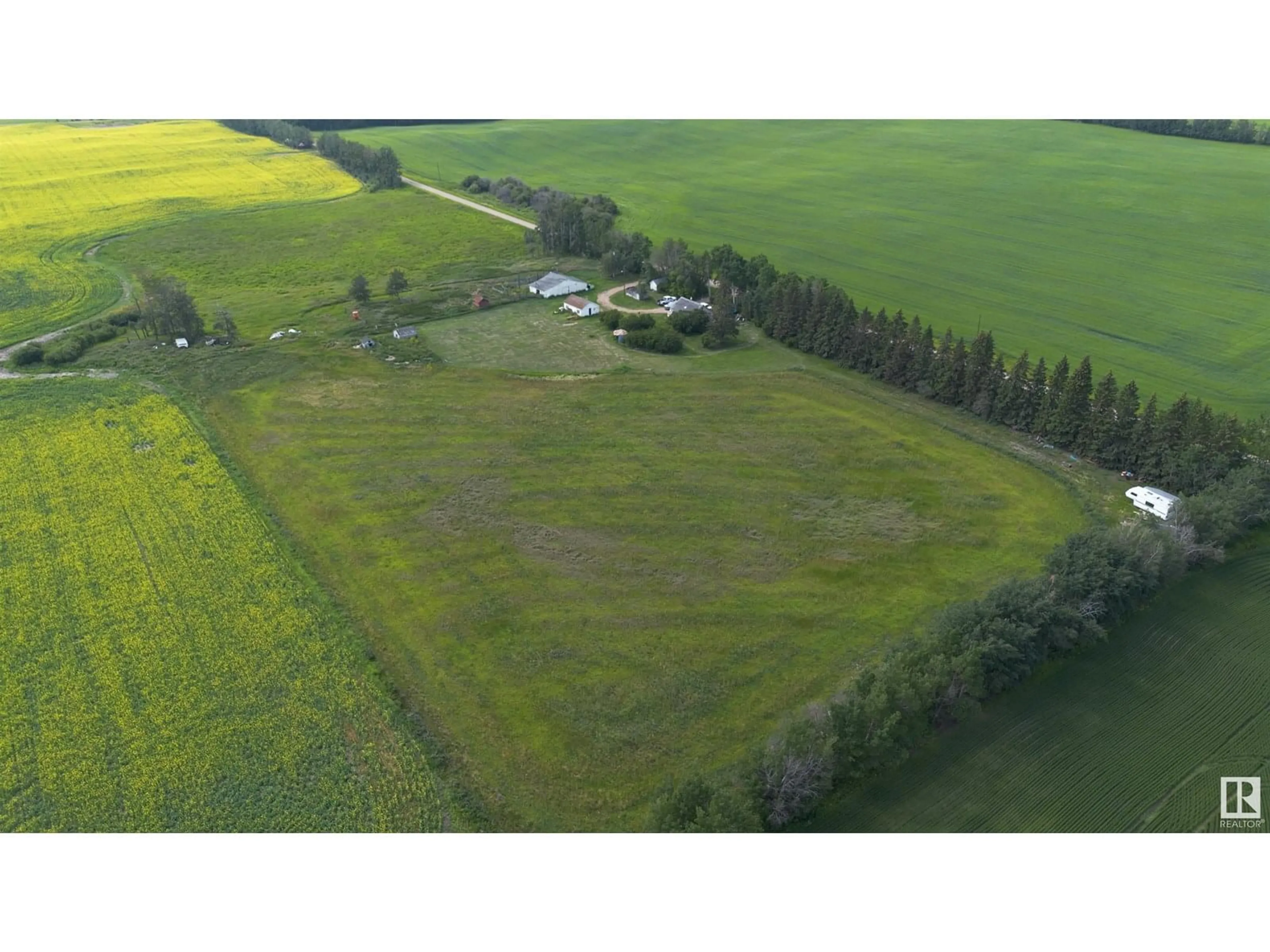 A pic from outside/outdoor area/front of a property/back of a property/a pic from drone, unknown for 25019 TWP RD 614 A, Rural Westlock County Alberta T0G1S0