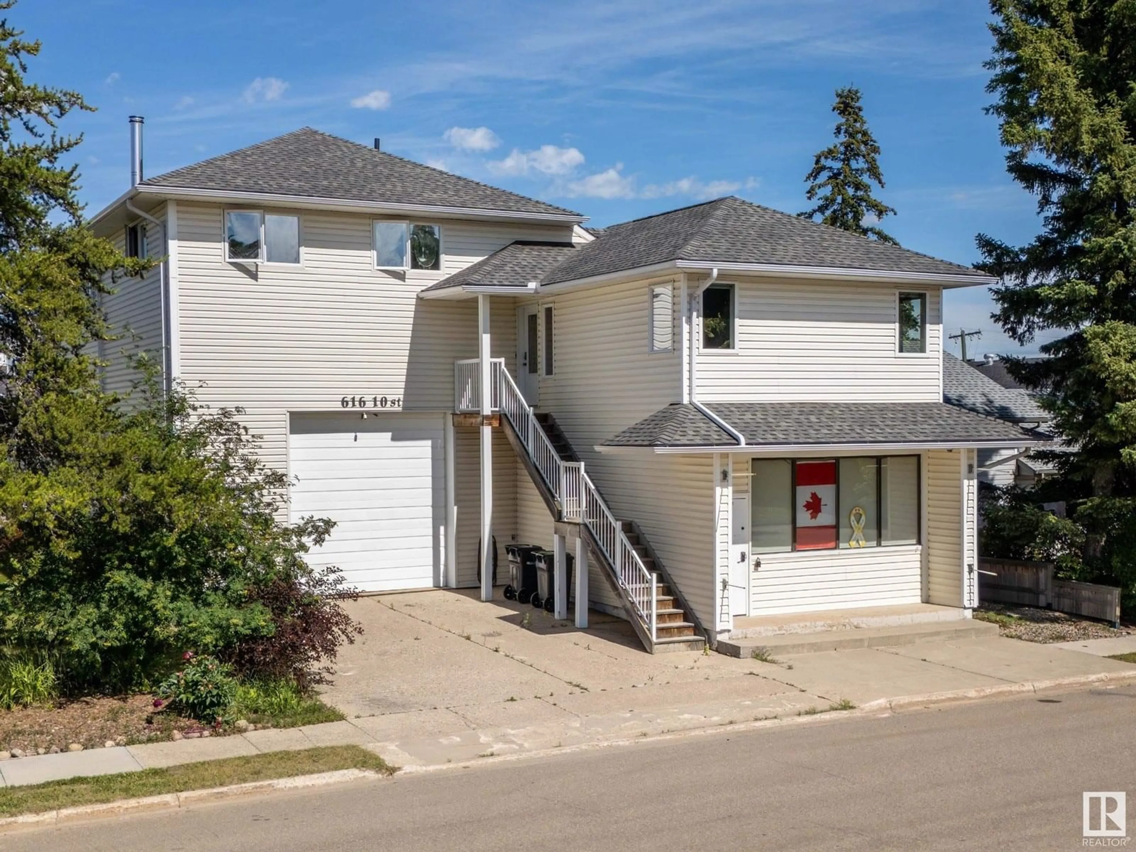 Home with vinyl exterior material, street for 616 10 ST, Cold Lake Alberta T9M1B1