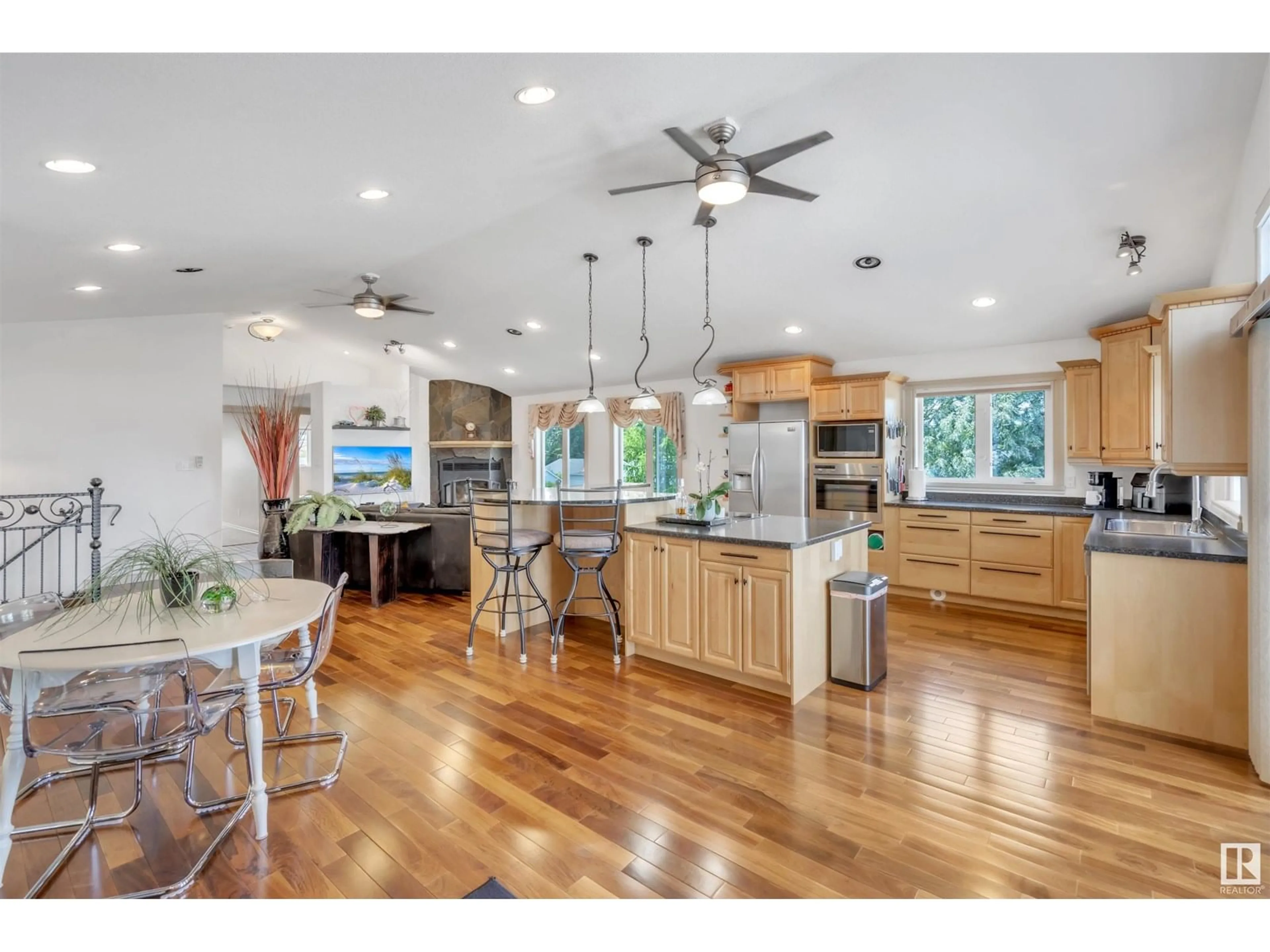 Open concept kitchen, wood/laminate floor for 616 10 ST, Cold Lake Alberta T9M1B1