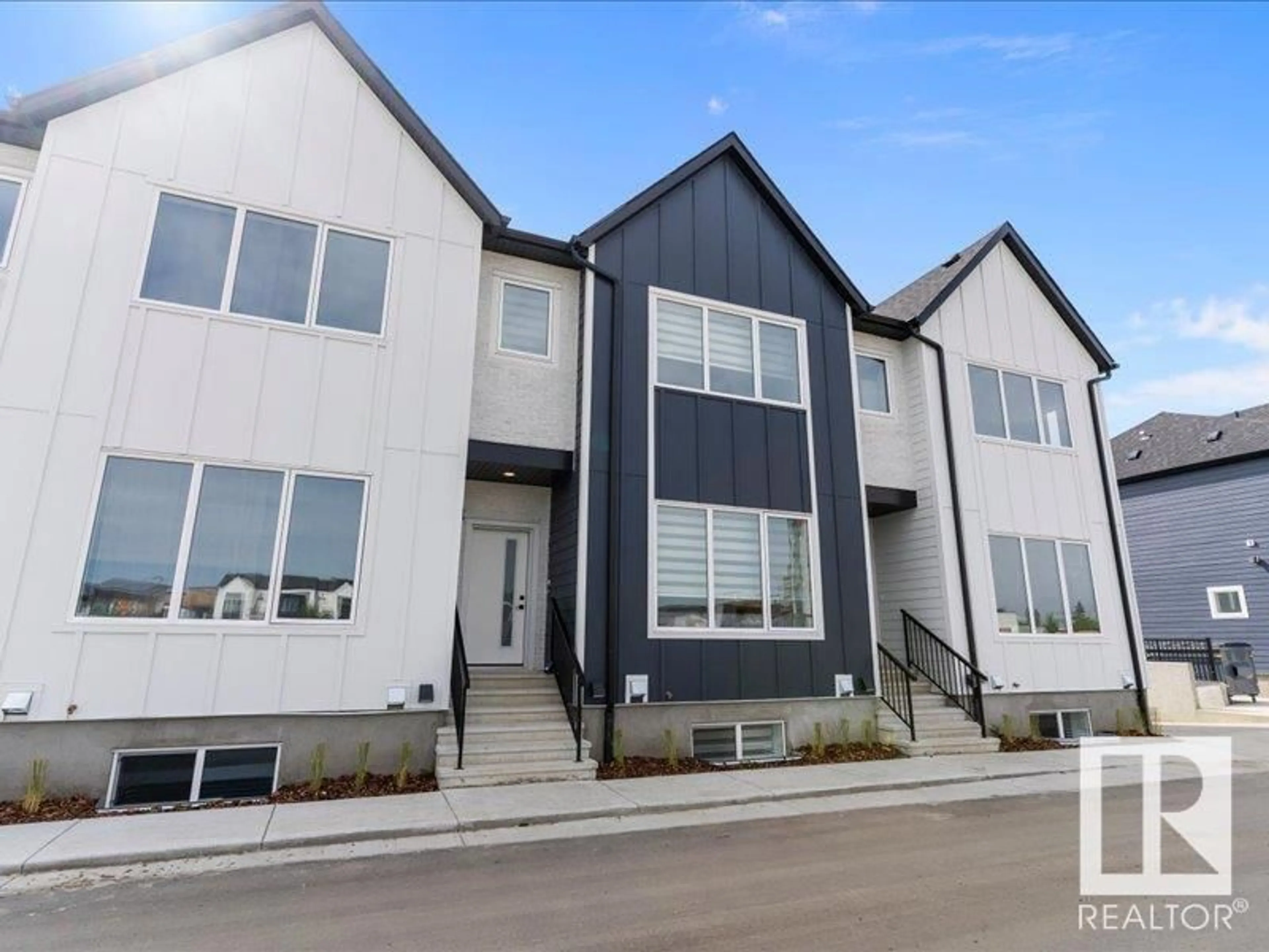 Home with vinyl exterior material, street for 14 - 7066 FANE RD, Edmonton Alberta T5G3A4