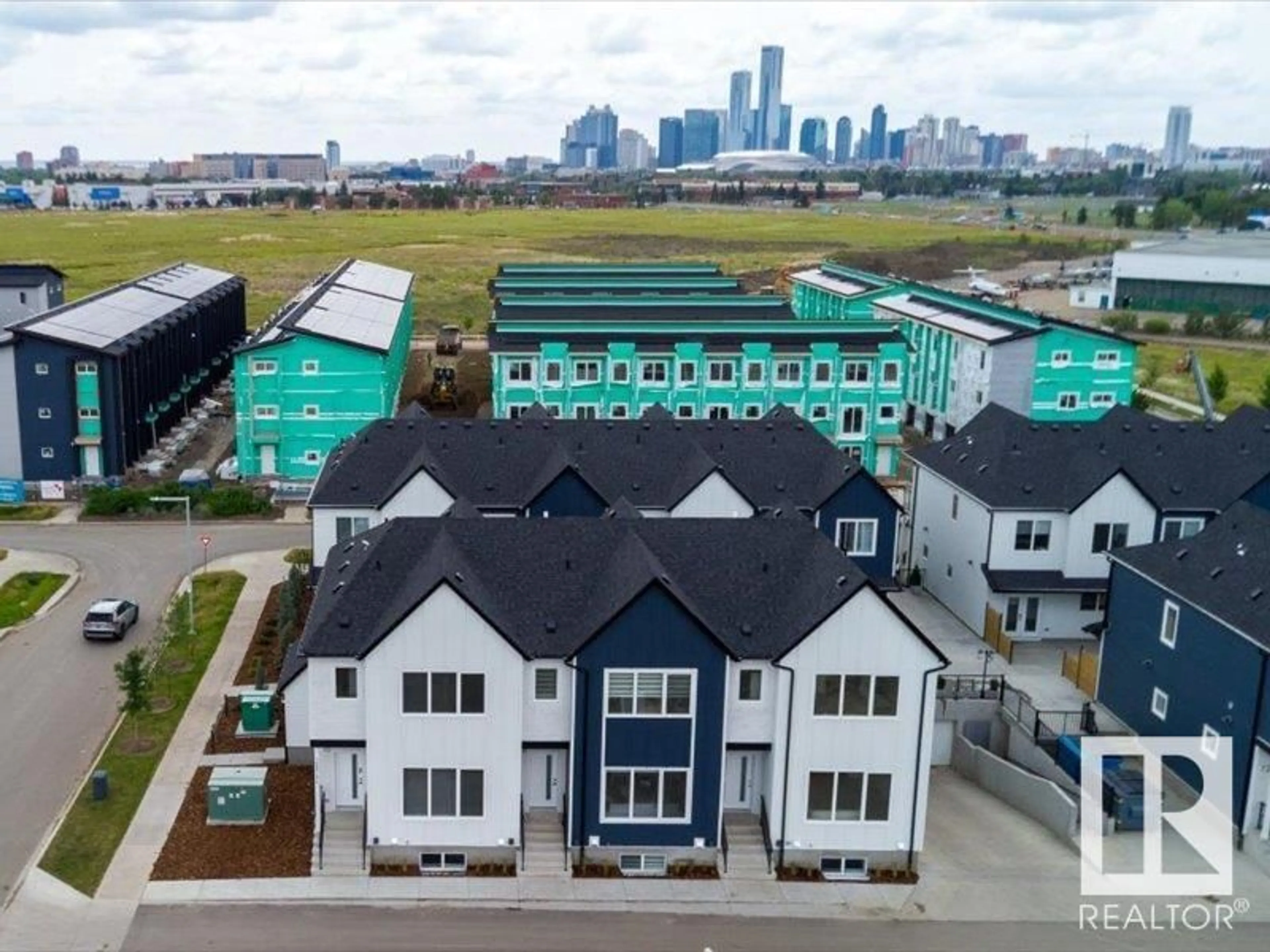 A pic from outside/outdoor area/front of a property/back of a property/a pic from drone, city buildings view from balcony for 14 - 7066 FANE RD, Edmonton Alberta T5G3A4