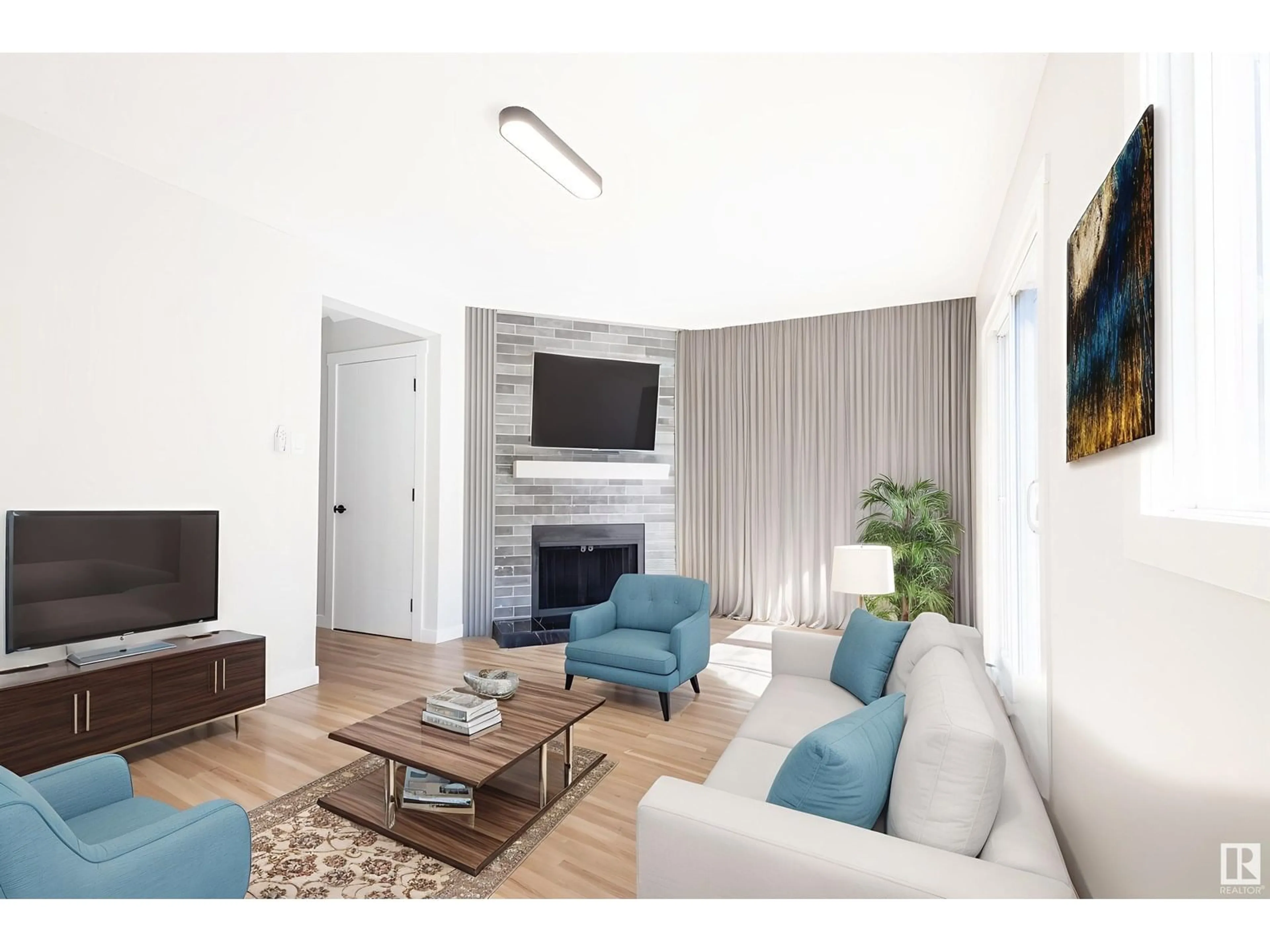 Living room with furniture, wood/laminate floor for 1155 HOOKE RD, Edmonton Alberta T5A4A5
