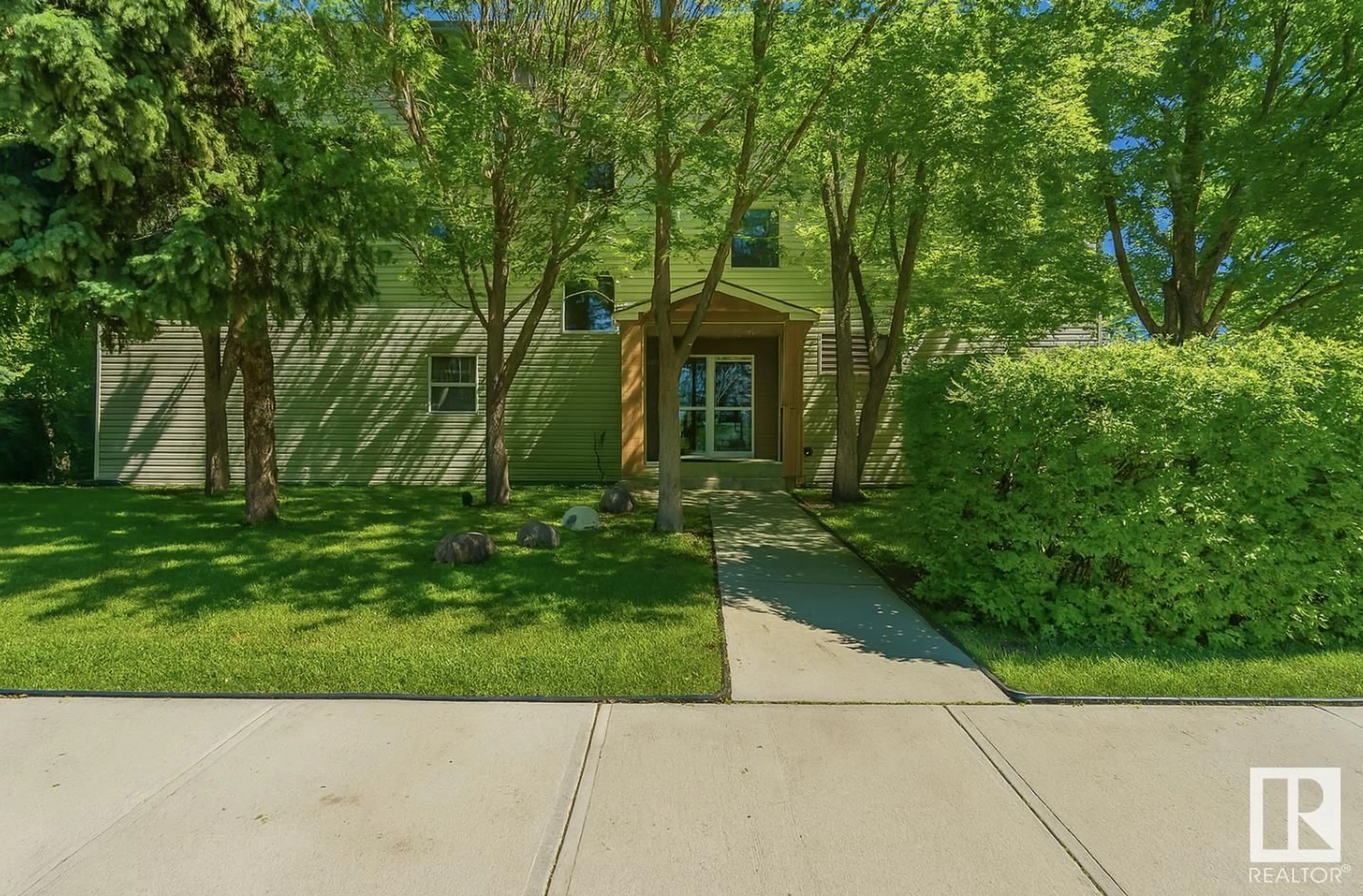 A pic from outside/outdoor area/front of a property/back of a property/a pic from drone, street for #206 - 12110 119 AVENUE, Edmonton Alberta T5L5G9