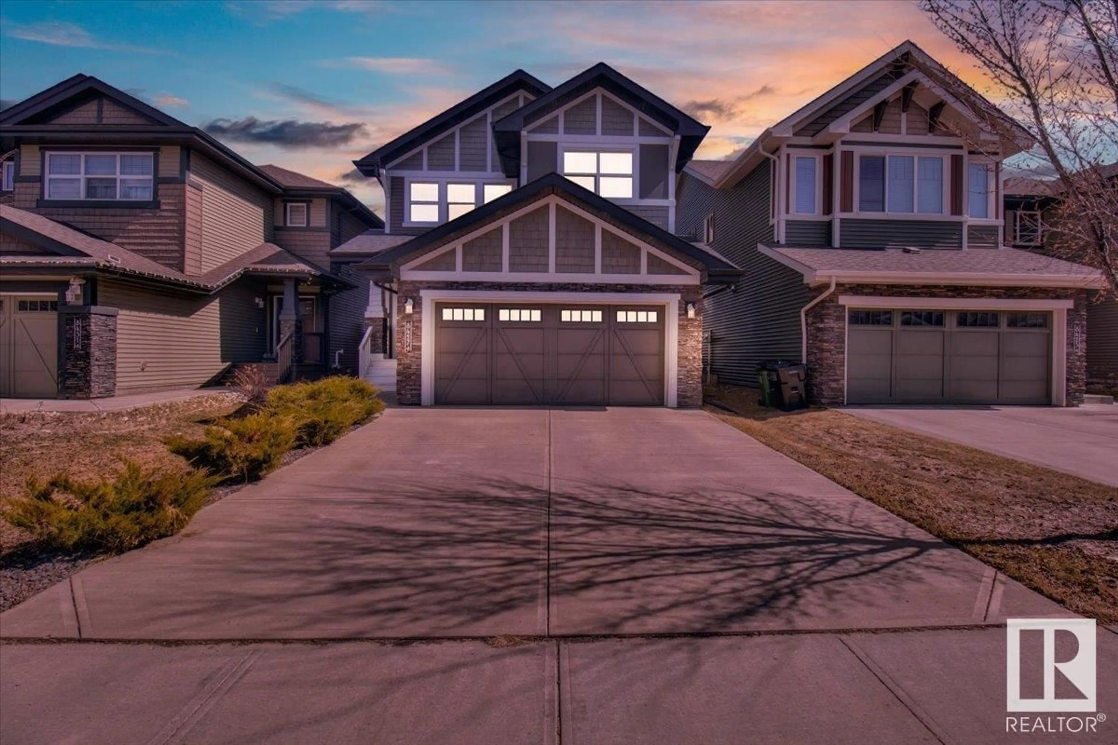 Home with vinyl exterior material, street for 8427 216 ST, Edmonton Alberta T5T4W2