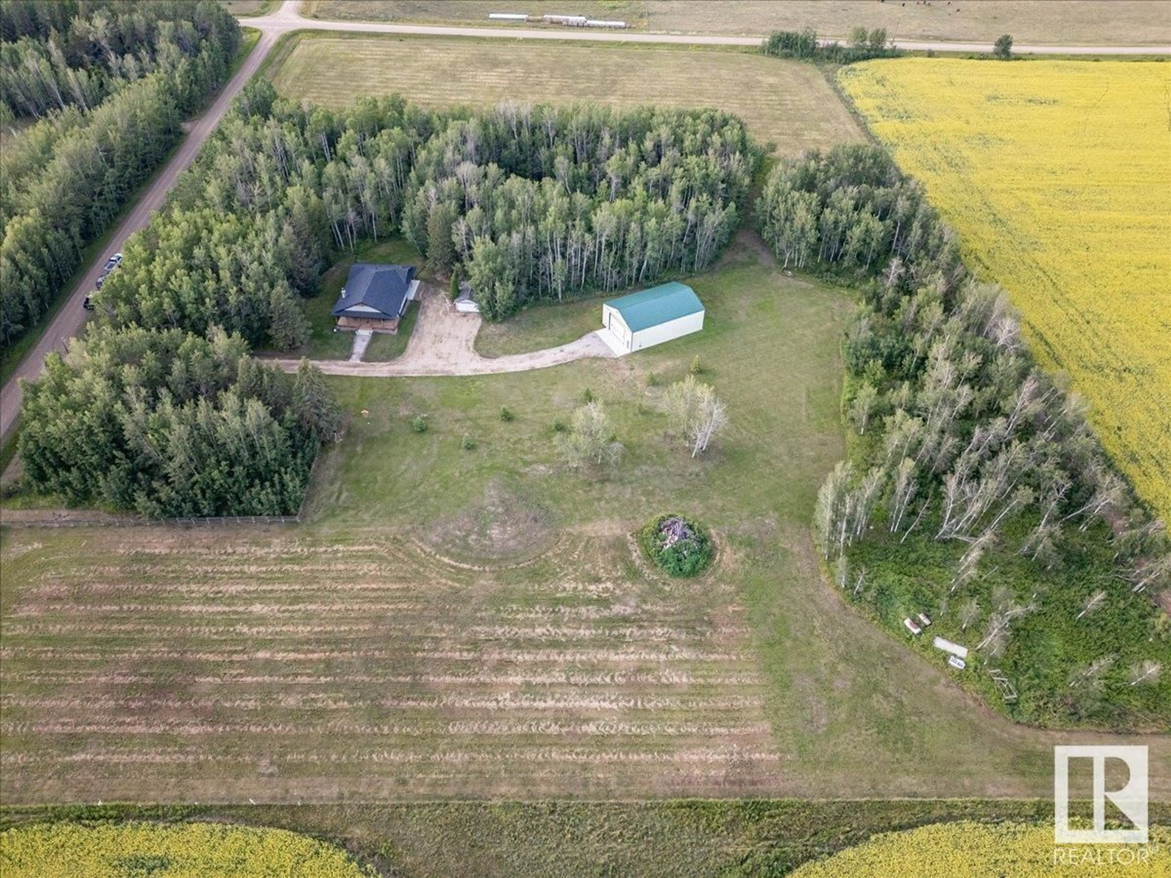 A pic from outside/outdoor area/front of a property/back of a property/a pic from drone, forest/trees view for 50371 RGE ROAD 23, Rural Leduc County Alberta T0C2P0