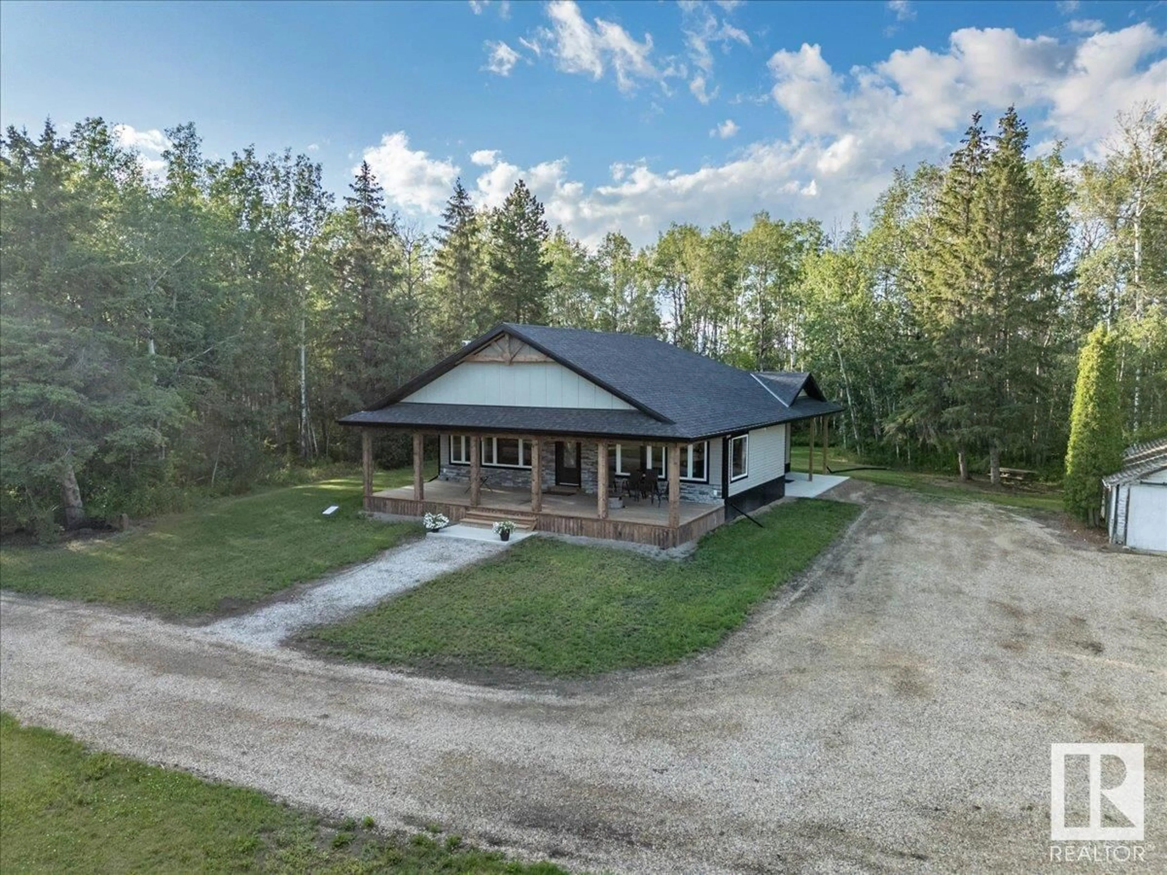 A pic from outside/outdoor area/front of a property/back of a property/a pic from drone, building for 50371 RGE ROAD 23, Rural Leduc County Alberta T0C2P0
