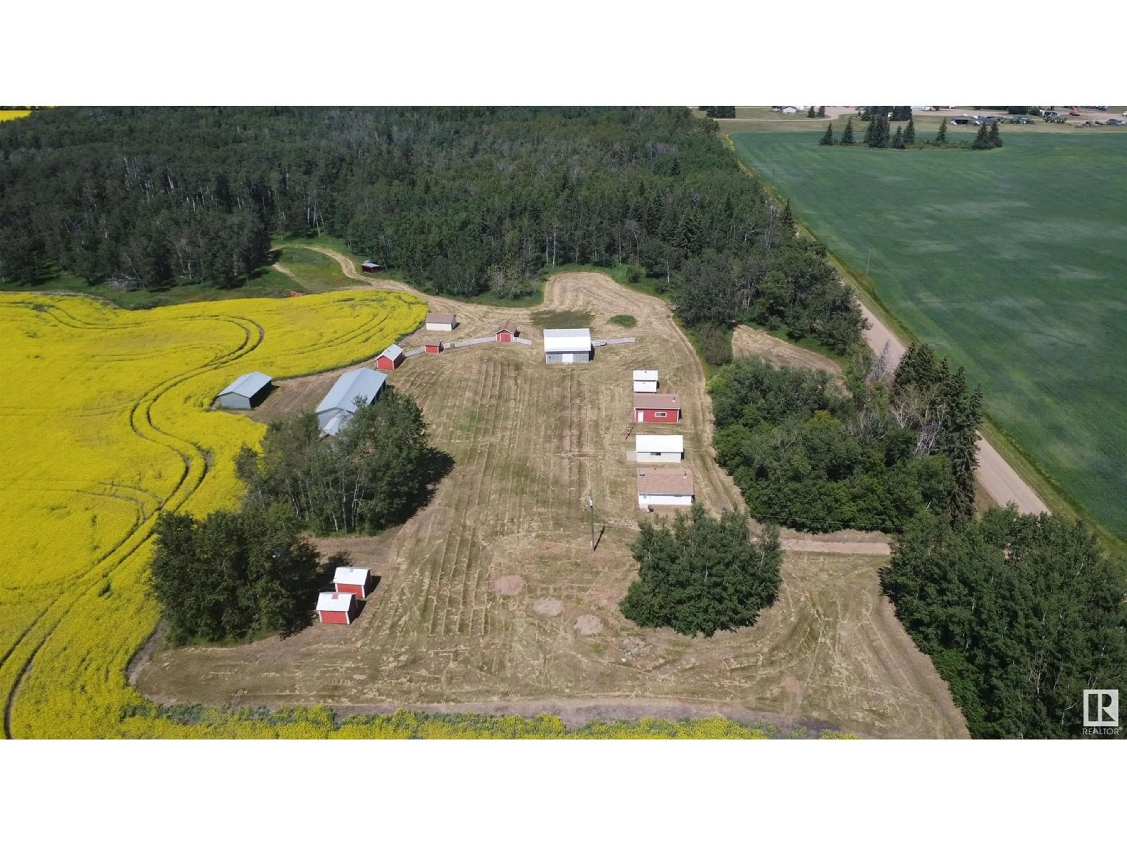 A pic from outside/outdoor area/front of a property/back of a property/a pic from drone, mountain view for 59304 RG RD 230, Rural Thorhild County Alberta T0G0P0