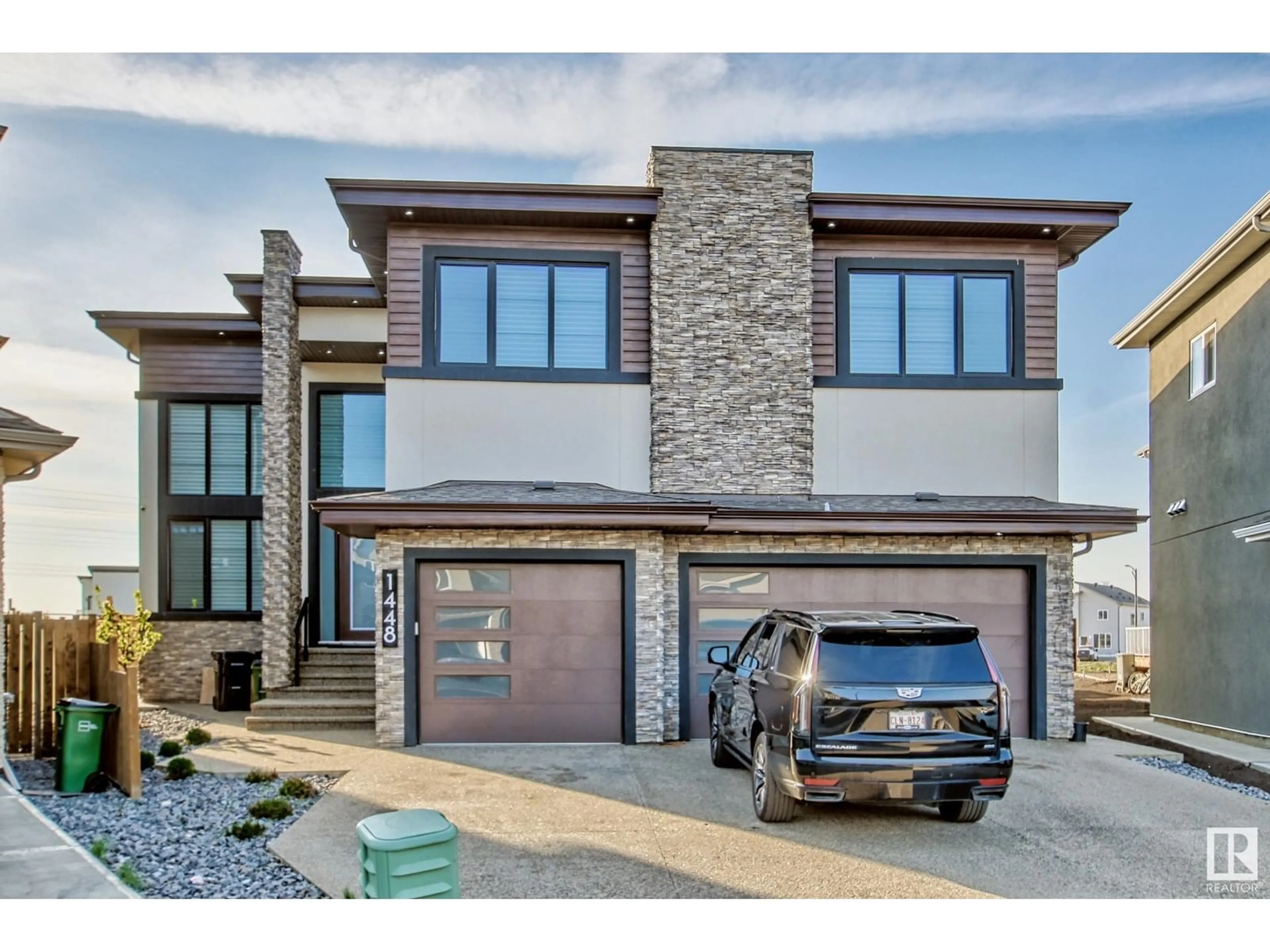 Home with brick exterior material, street for NW - 1448 25 ST, Edmonton Alberta T6T2K7