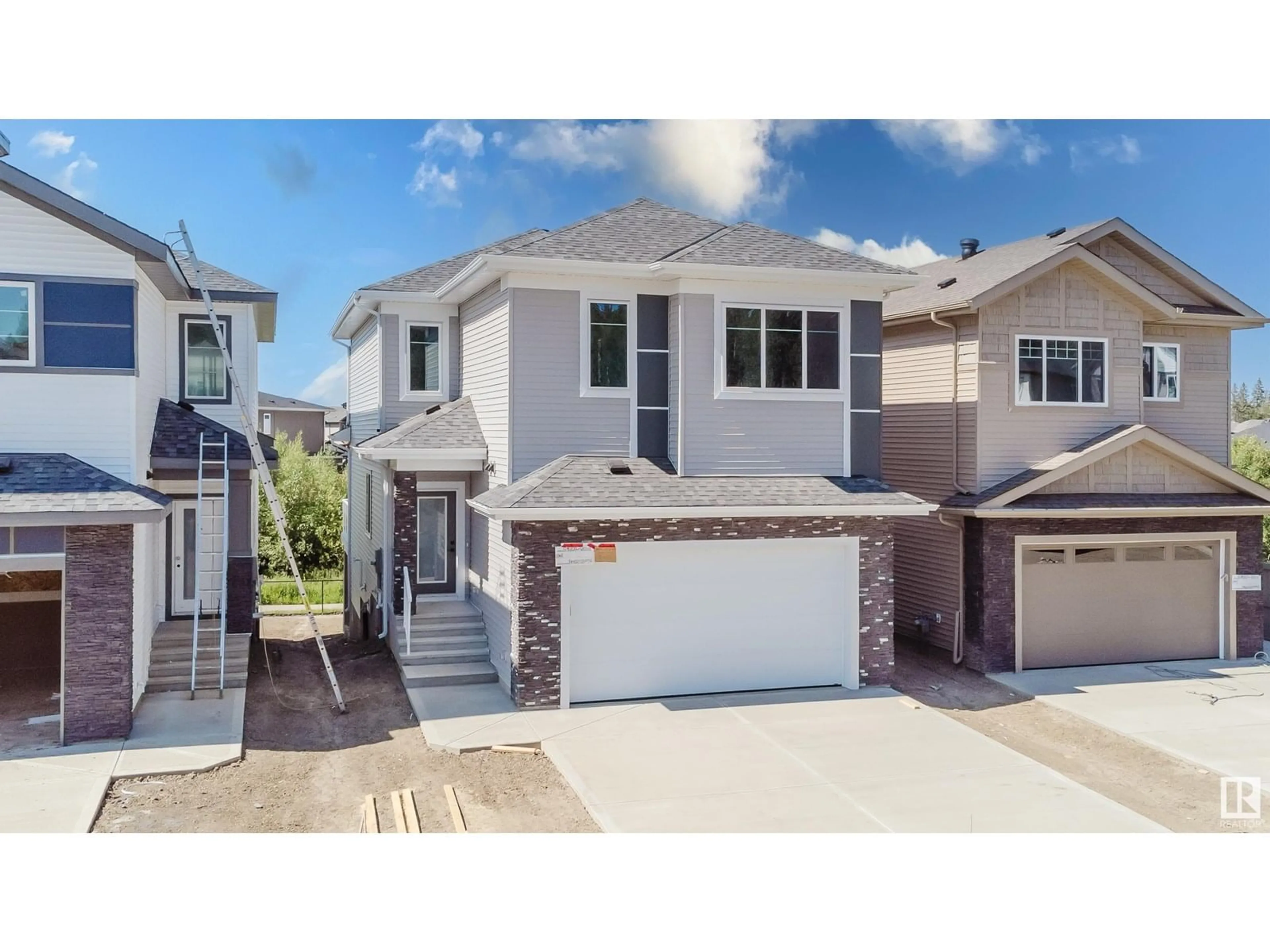 Home with vinyl exterior material, street for 67 MEADOWGROVE LN, Spruce Grove Alberta T7X0W2