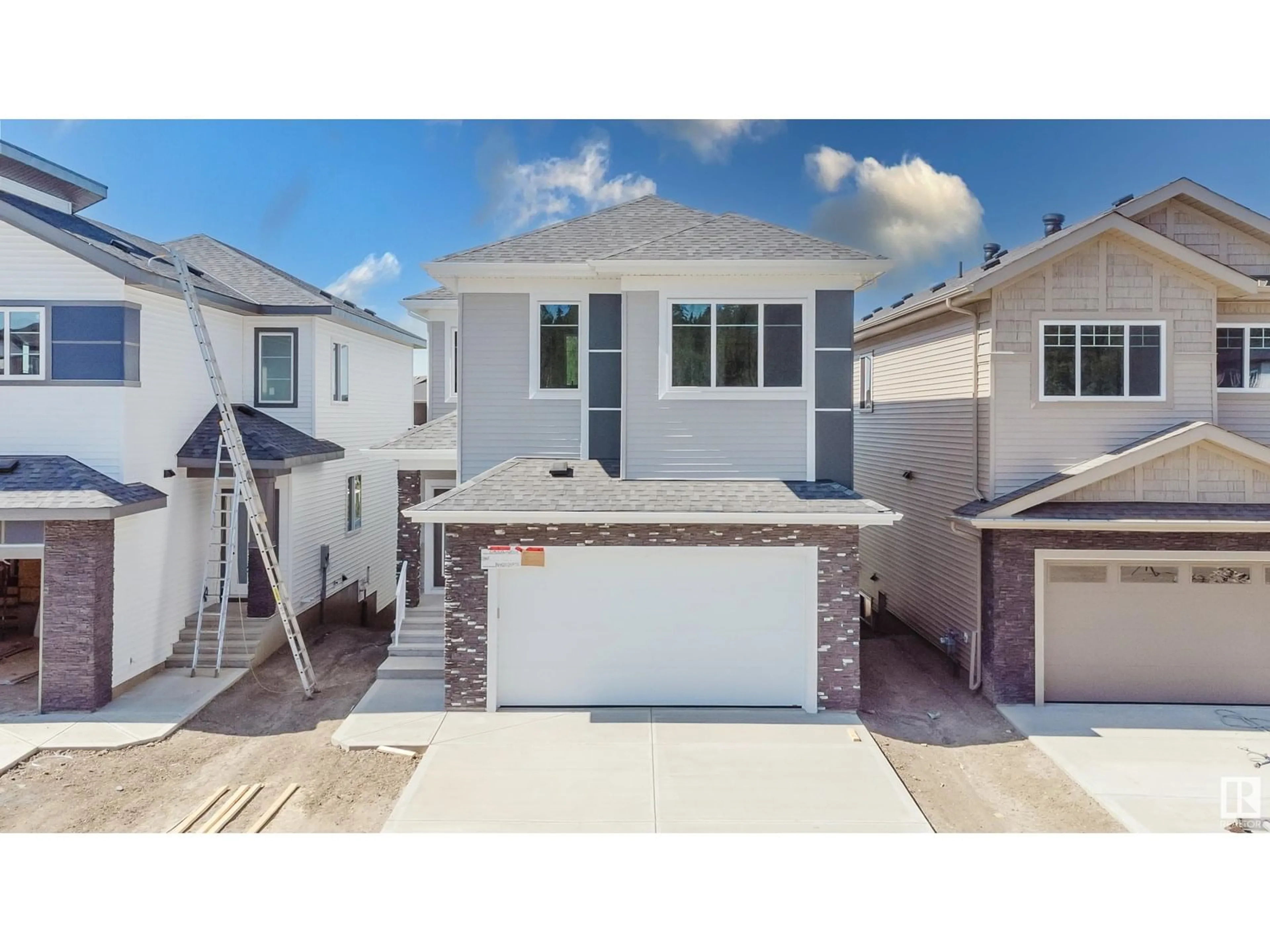 Home with vinyl exterior material, street for 67 MEADOWGROVE LN, Spruce Grove Alberta T7X0W2