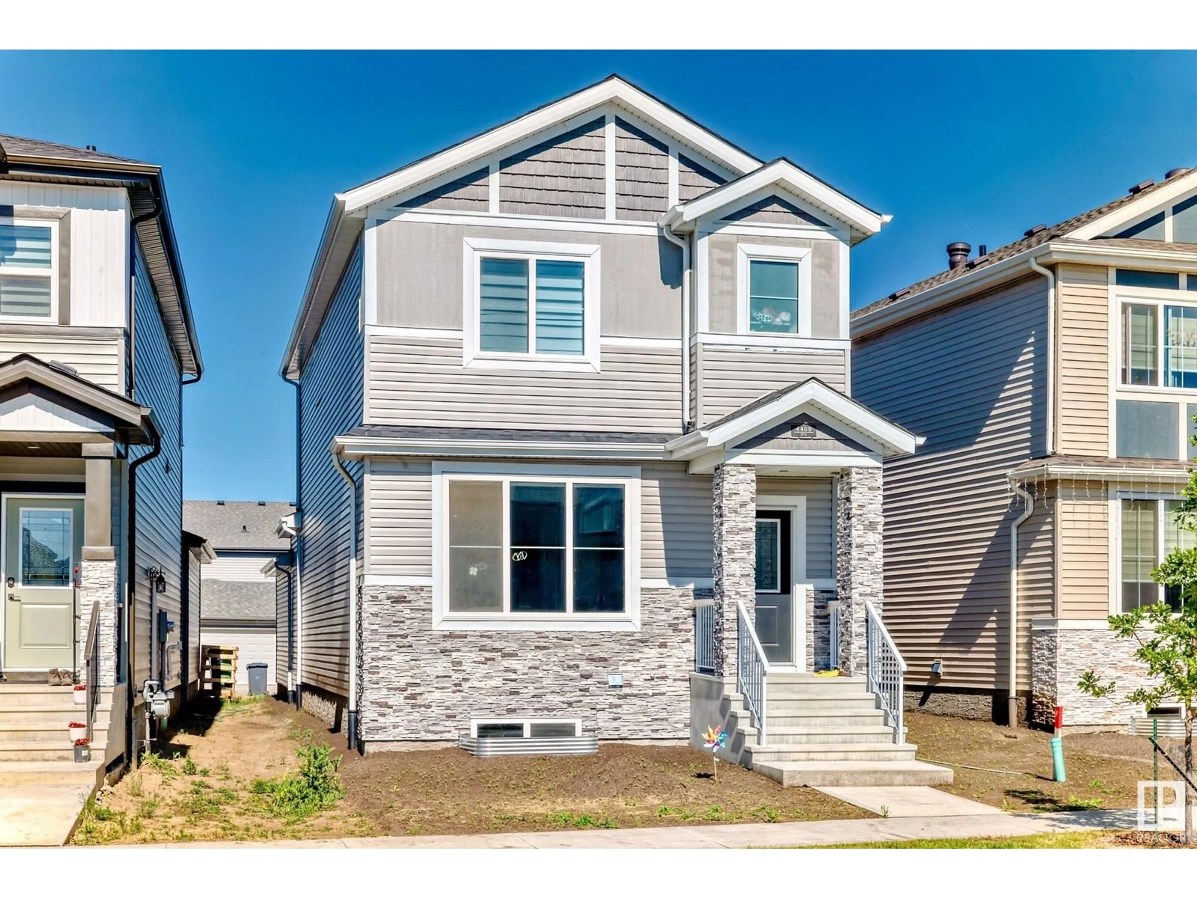 Home with vinyl exterior material, street for 4409 37 ST, Beaumont Alberta T4X2X1