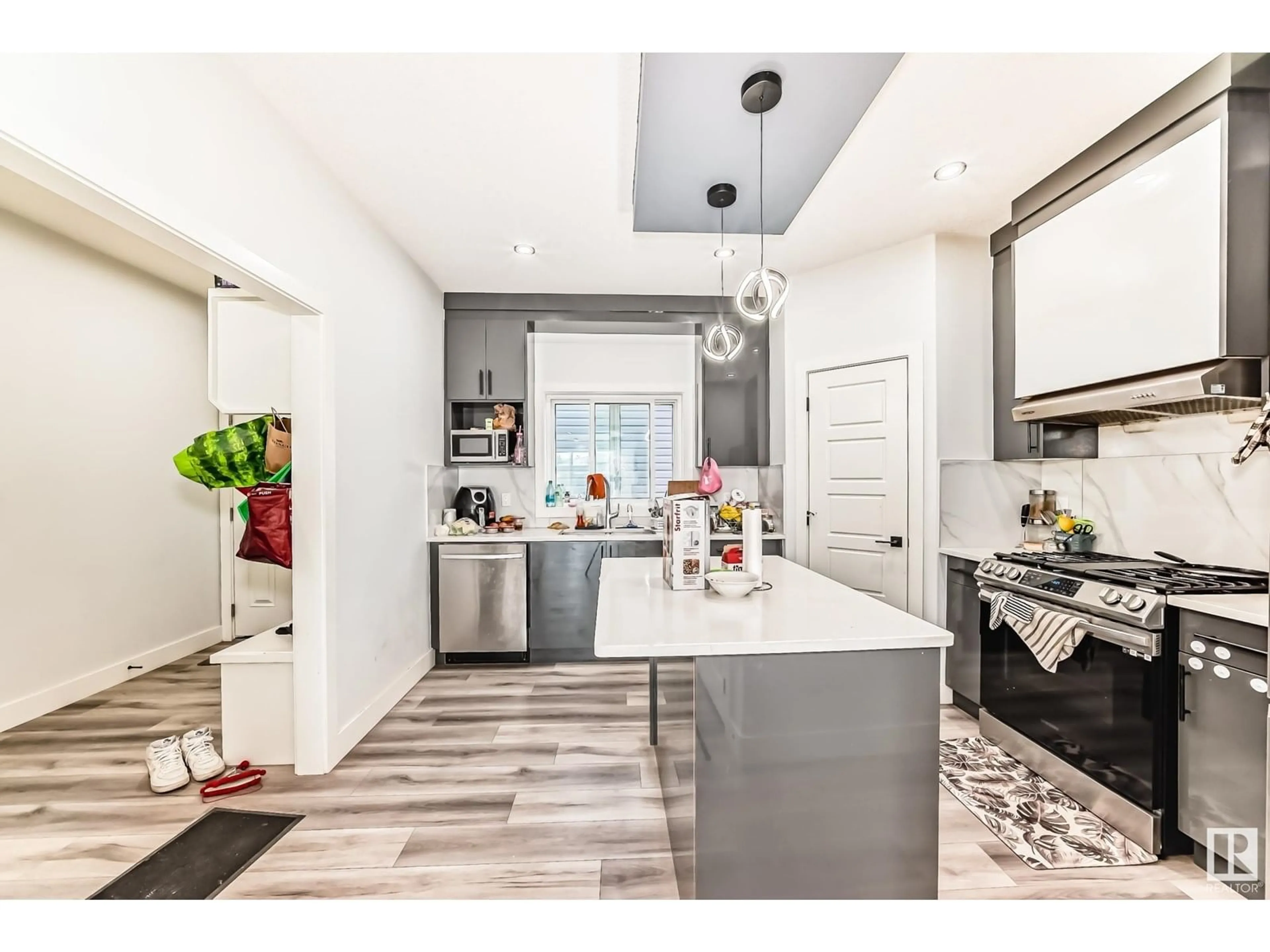 Open concept kitchen, ceramic/tile floor for 4409 37 ST, Beaumont Alberta T4X2X1