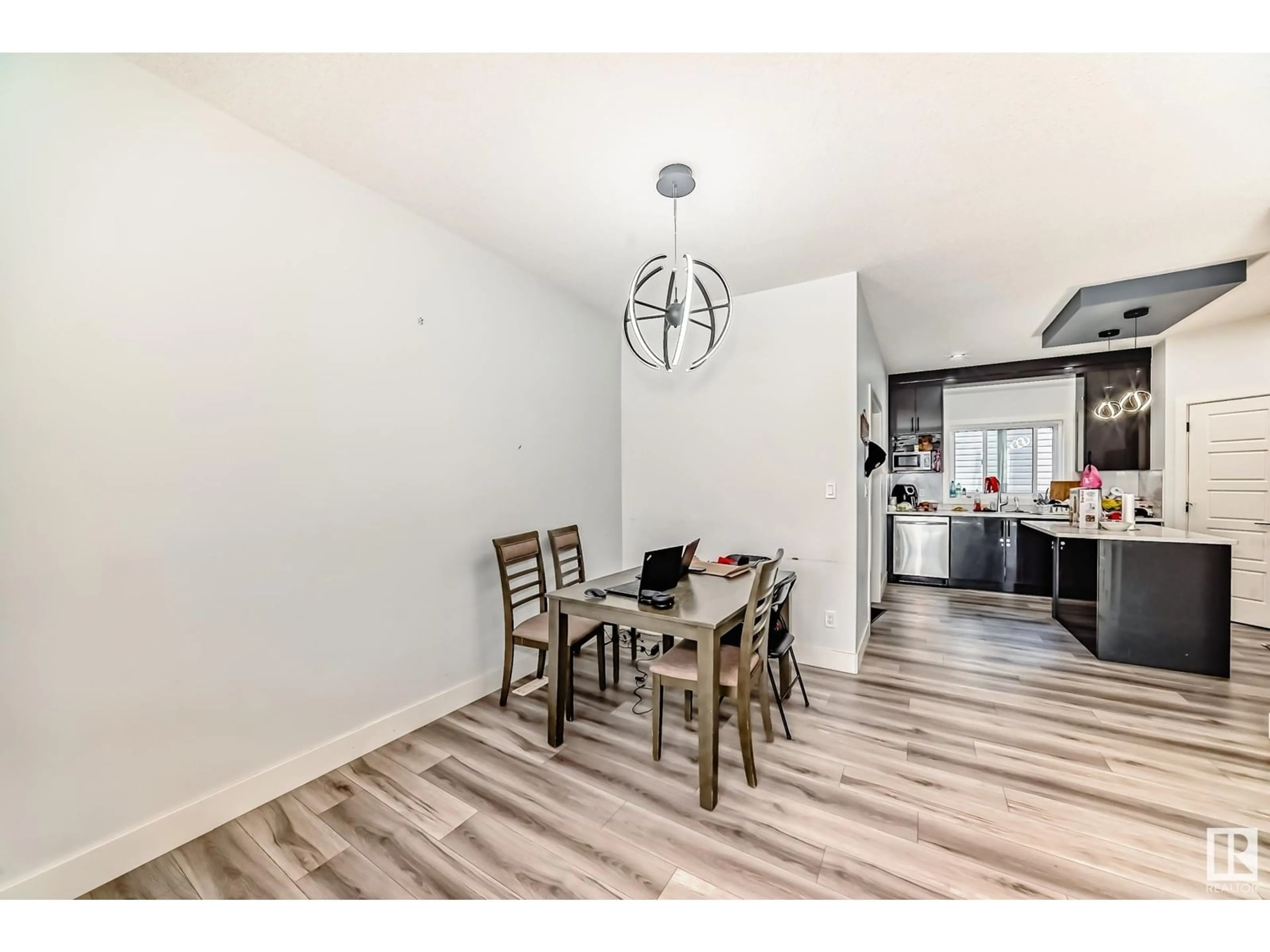 Dining room, wood/laminate floor for 4409 37 ST, Beaumont Alberta T4X2X1