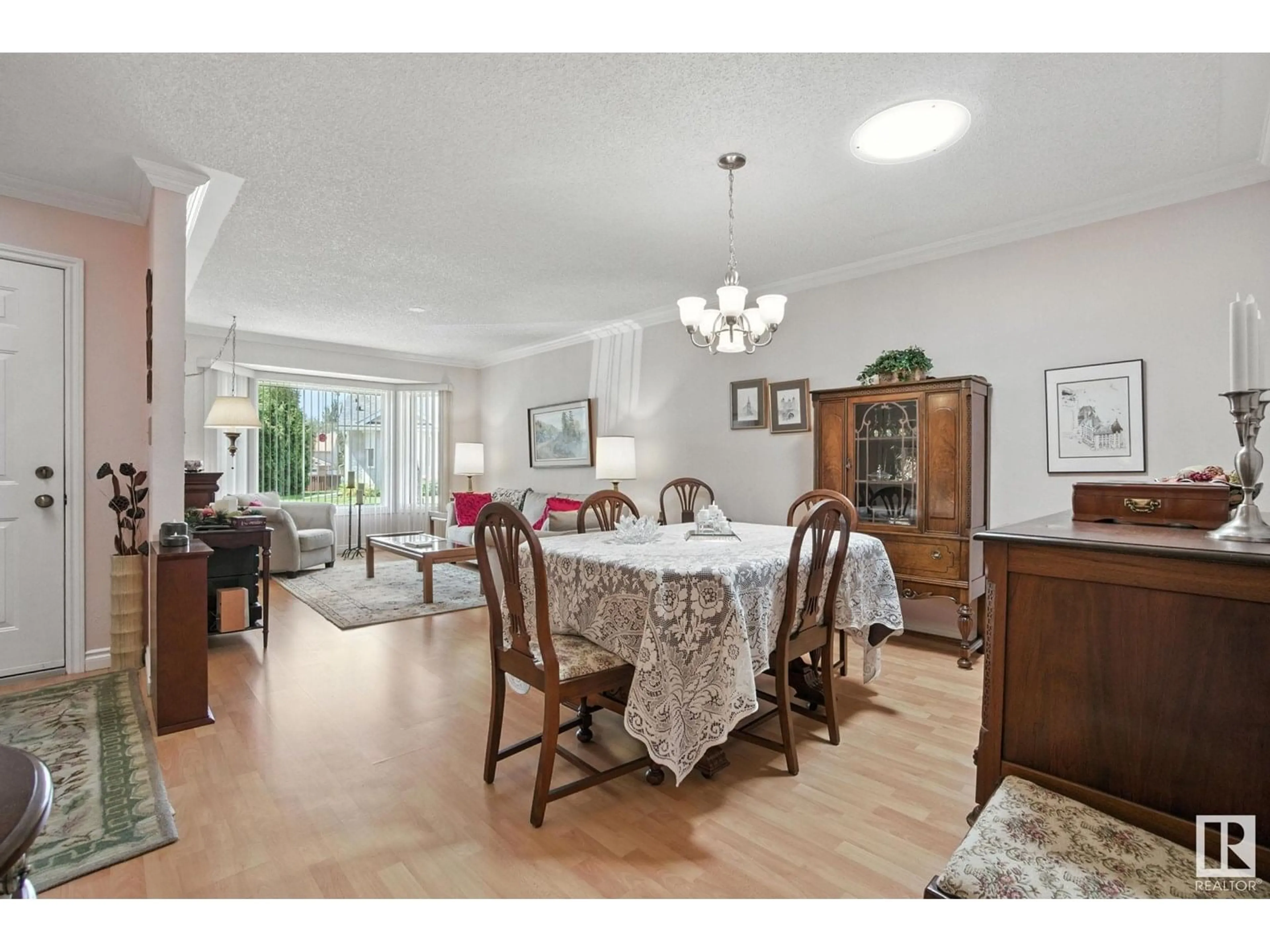 Dining room, wood/laminate floor for NW - 5785 189 ST, Edmonton Alberta T6M2G9