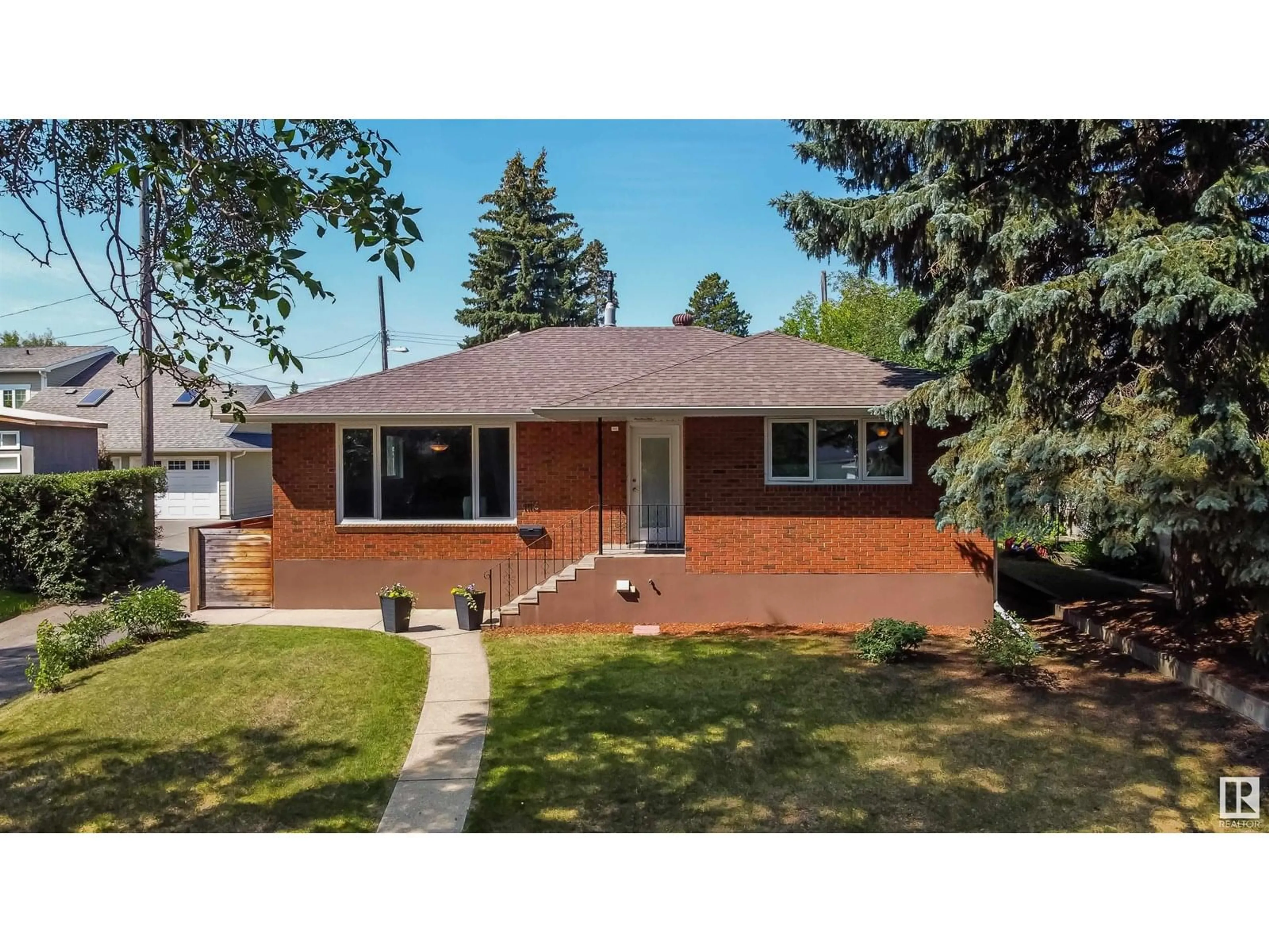Home with brick exterior material, street for NW - 11116 69 ST, Edmonton Alberta T5B1R4