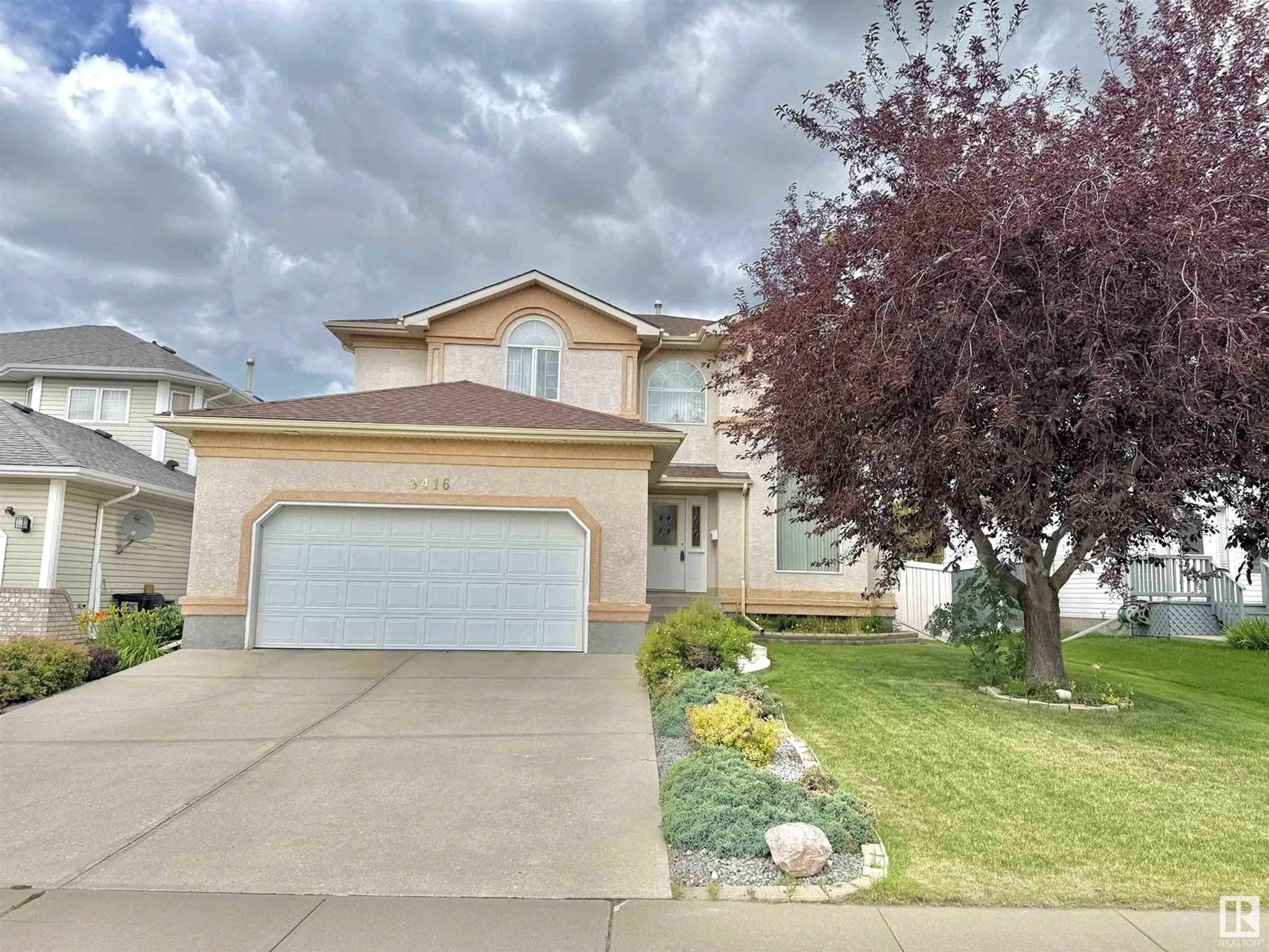 Home with vinyl exterior material, street for 8416 160A AV, Edmonton Alberta T5Z3K2