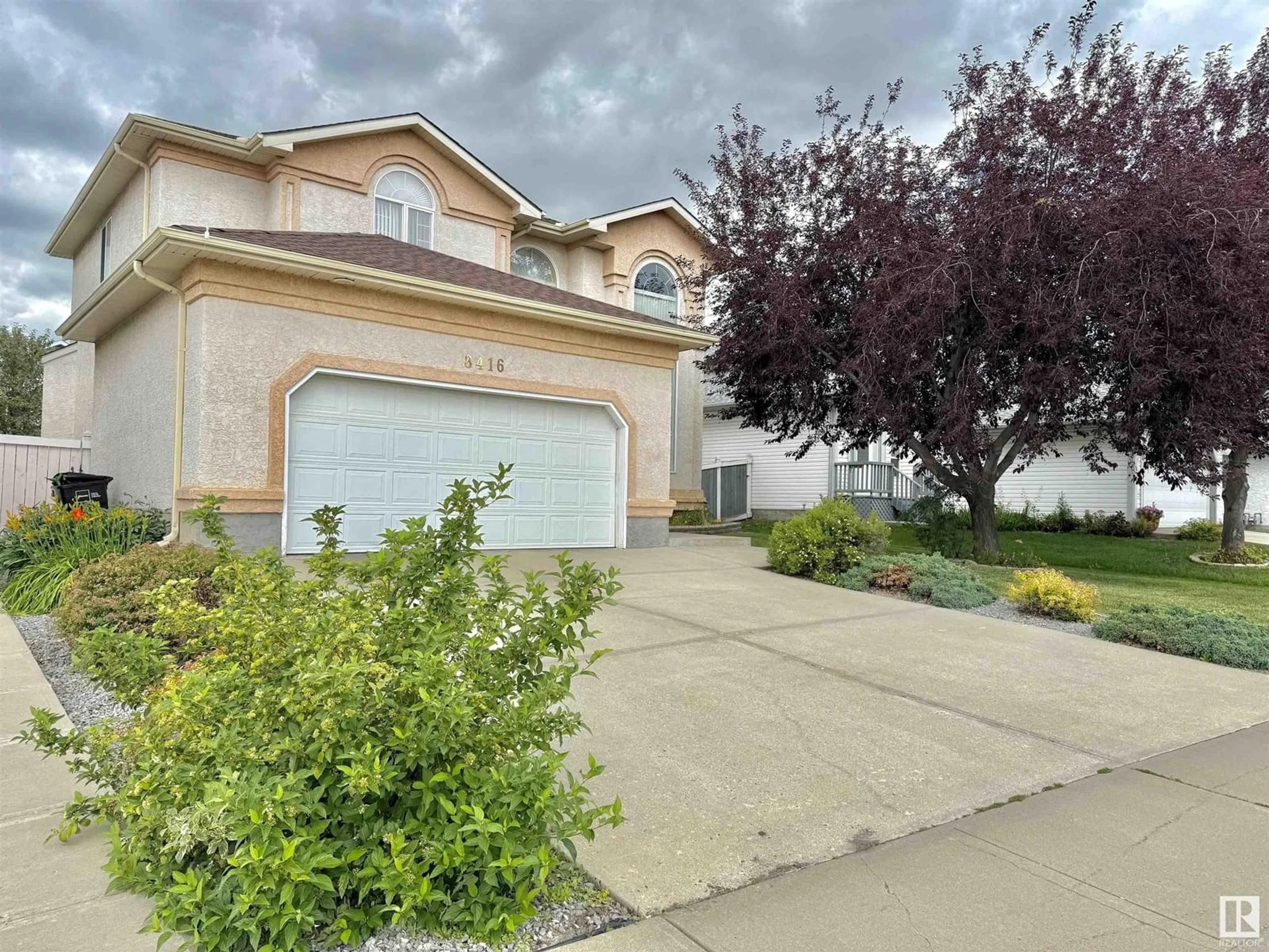 Home with vinyl exterior material, street for 8416 160A AV, Edmonton Alberta T5Z3K2