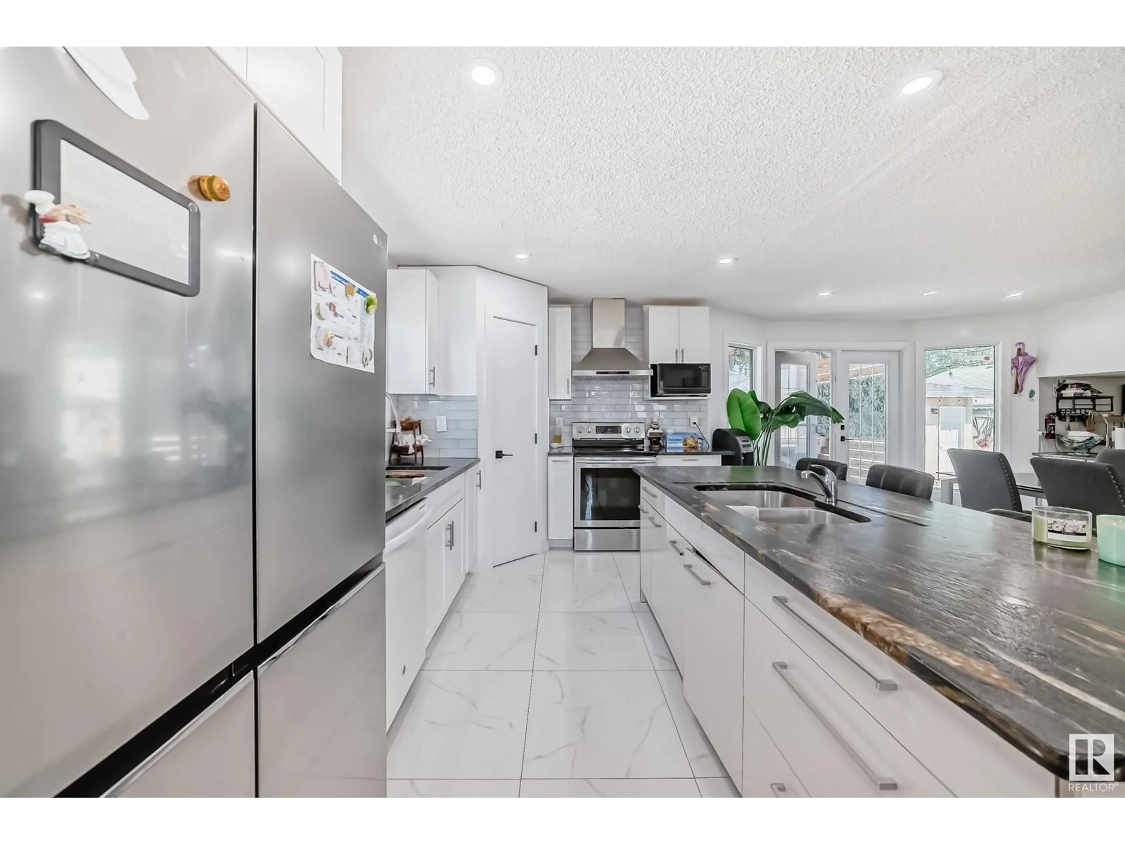 Open concept kitchen, ceramic/tile floor for 714 LEE RIDGE RD, Edmonton Alberta T6K0P2